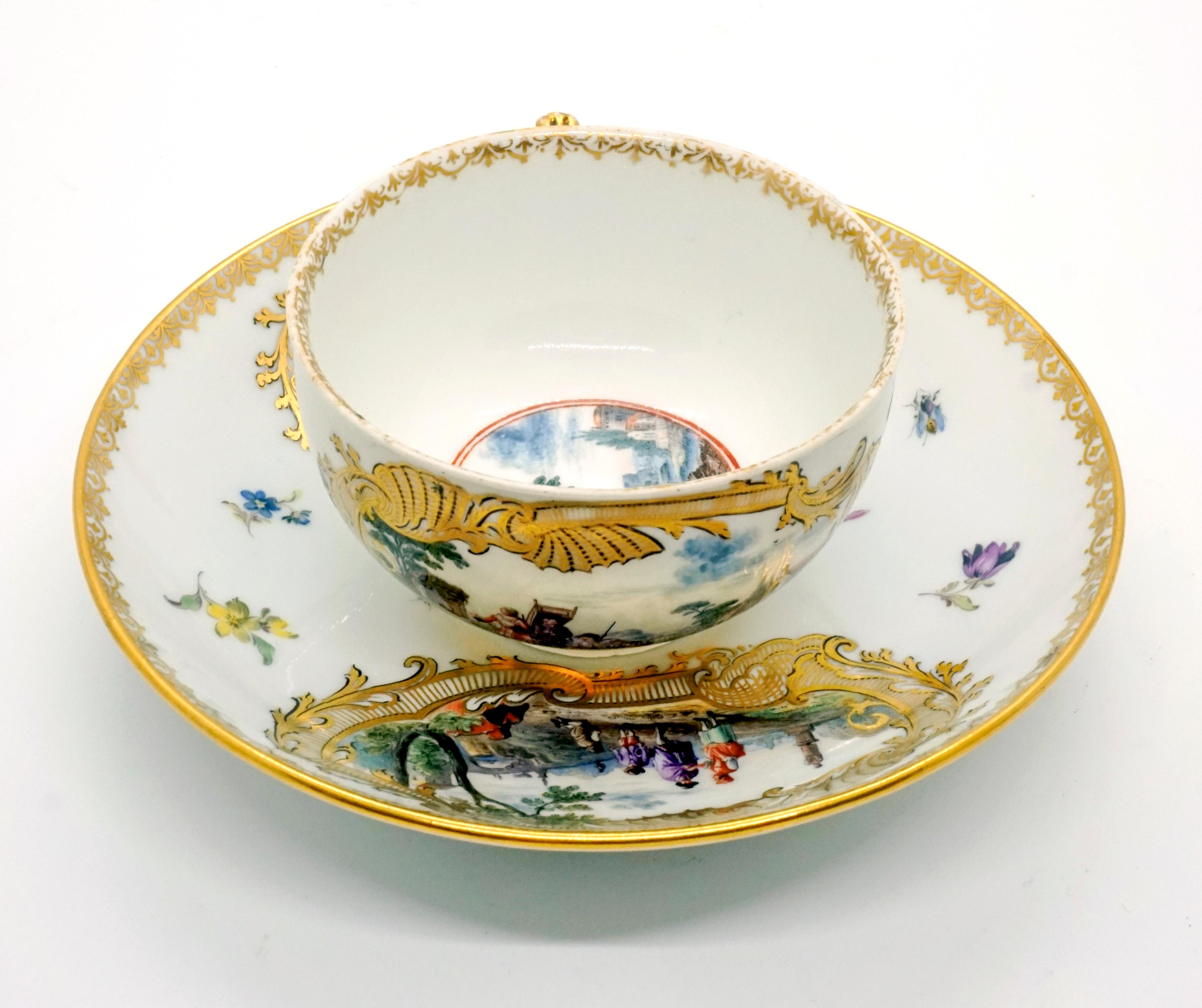 Rococo Eary 19th Century Meissen Cup and Saucer with Kauffahrtei Scenes and Gold Decor