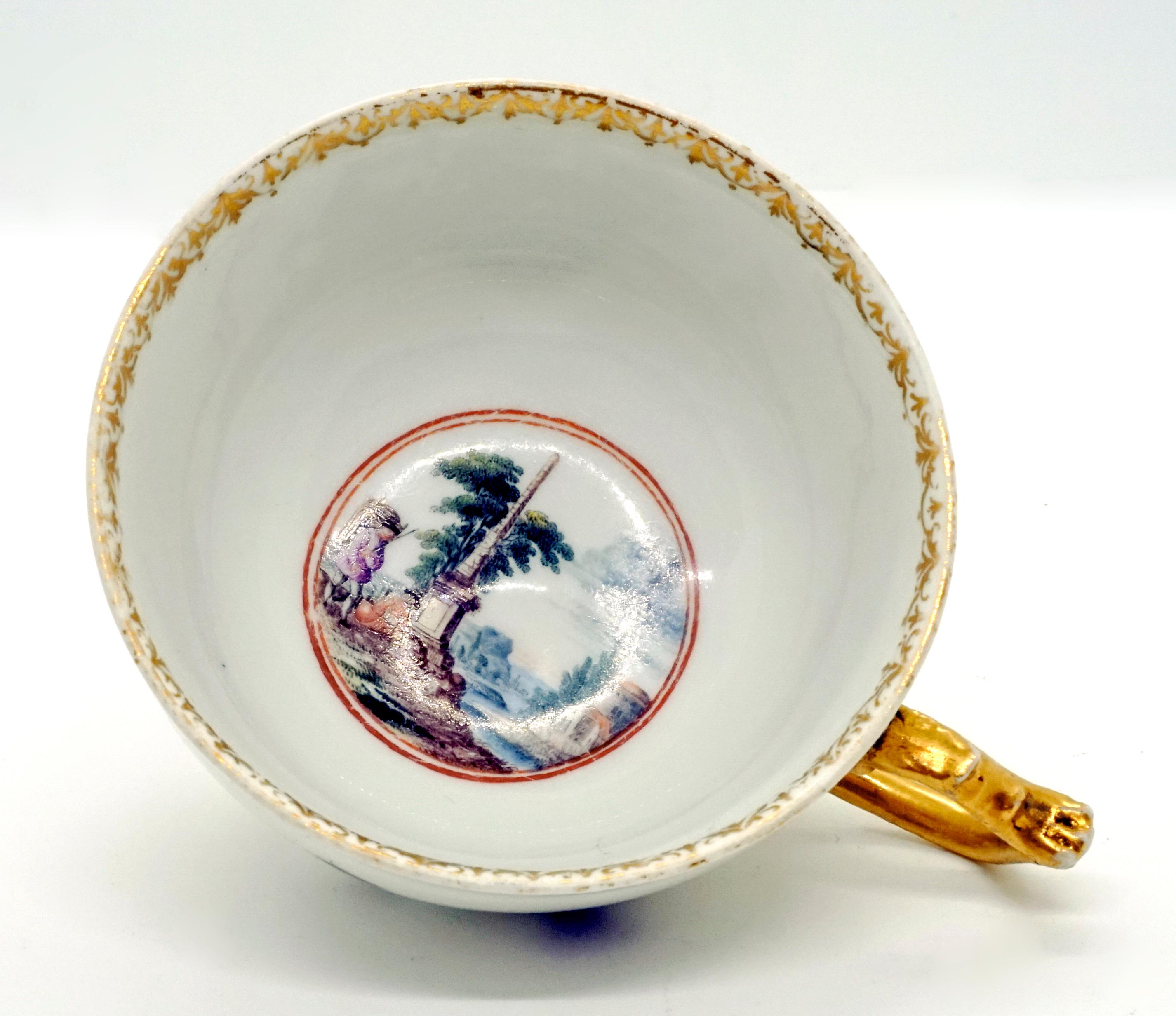 Hand-Crafted Eary 19th Century Meissen Cup and Saucer with Kauffahrtei Scenes and Gold Decor