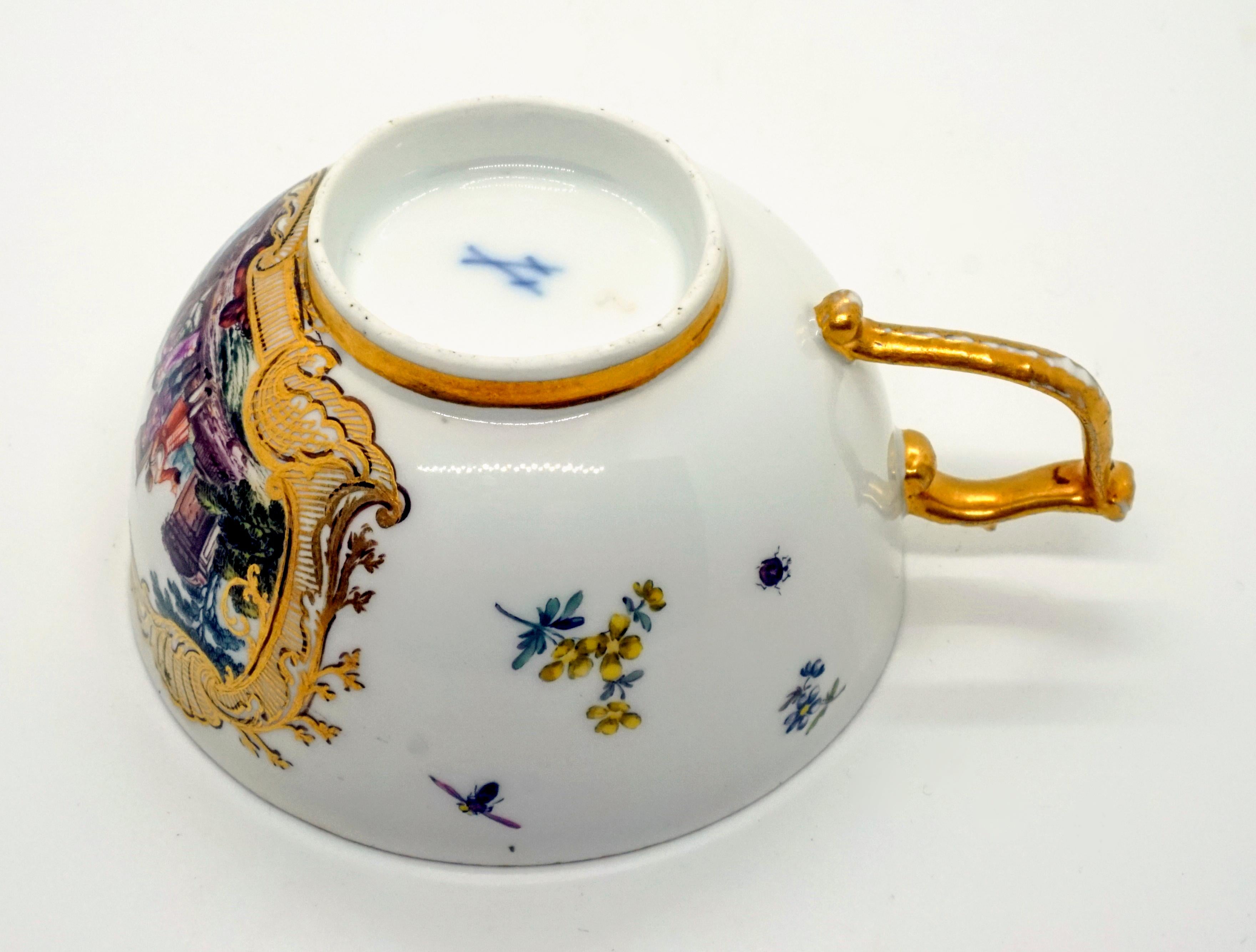 Porcelain Eary 19th Century Meissen Cup and Saucer with Kauffahrtei Scenes and Gold Decor