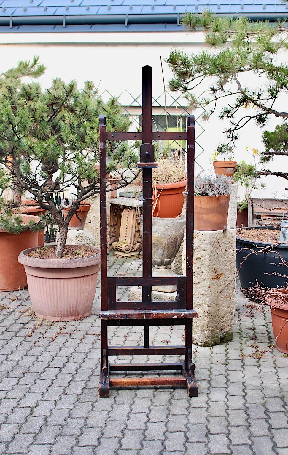 Mid Century Modern vintage easel from spruce and metal, Austria 1950s.
Beautiful easel with adjustable height from 184 cm to 270 cm from spruce, metal and brass details in brown color tone.
Good condition with signs of age and use like nice color