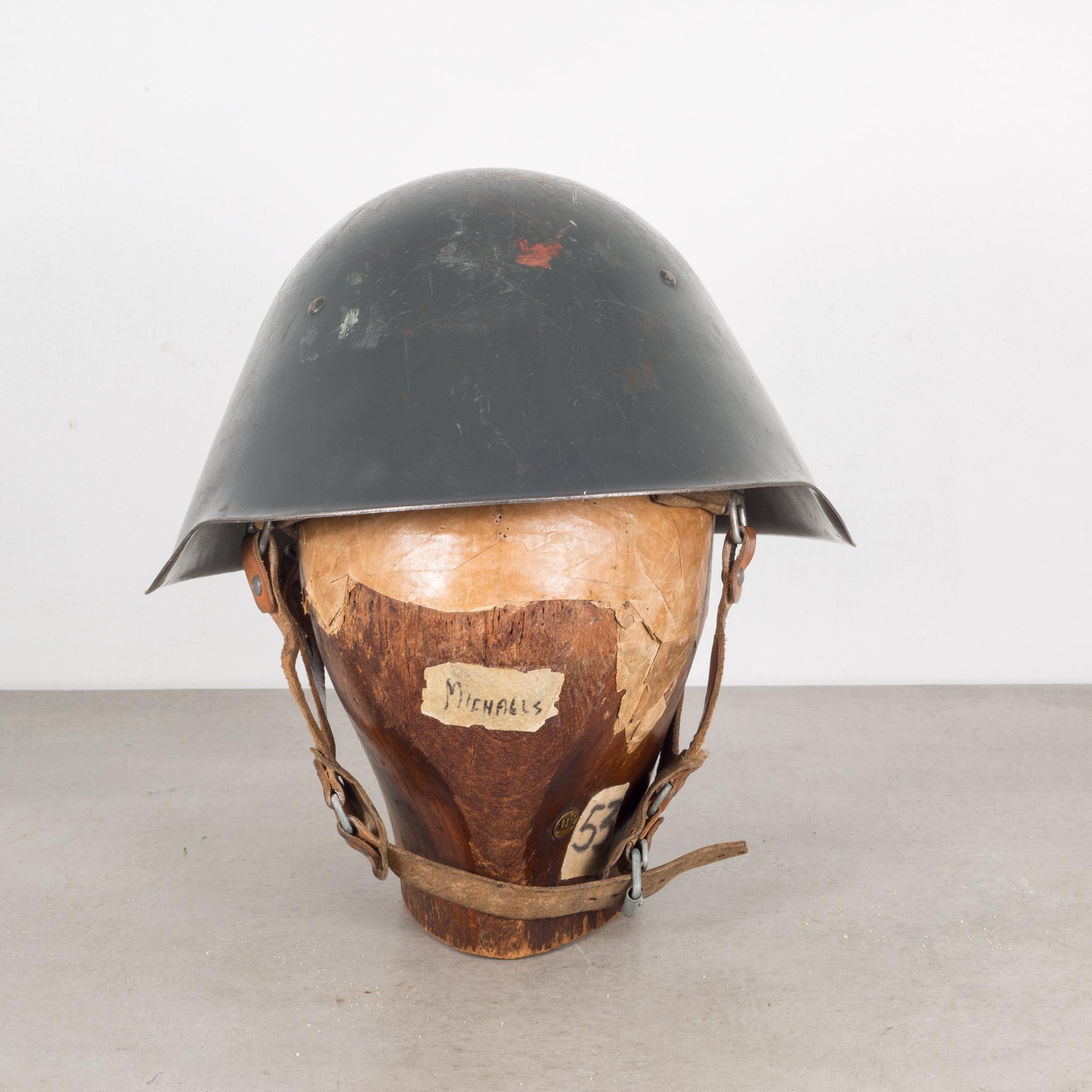 About

A metal East German M1956 army helmet with inner leather cap and leather straps. Hat mold sold separately.

 Creator: DPR East Germany Army.
 Date of manufacture Hat: circa 1940-1950s
Materials and techniques: Metal, leather.
