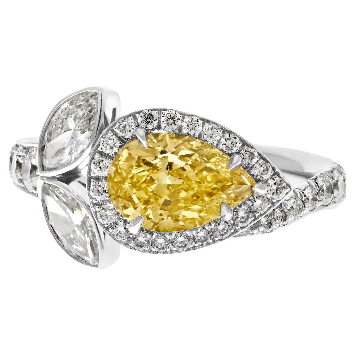 East West 1.17ct Fancy Yellow Pear cut Sapphire Halo Flower Cocktail Ring For Sale