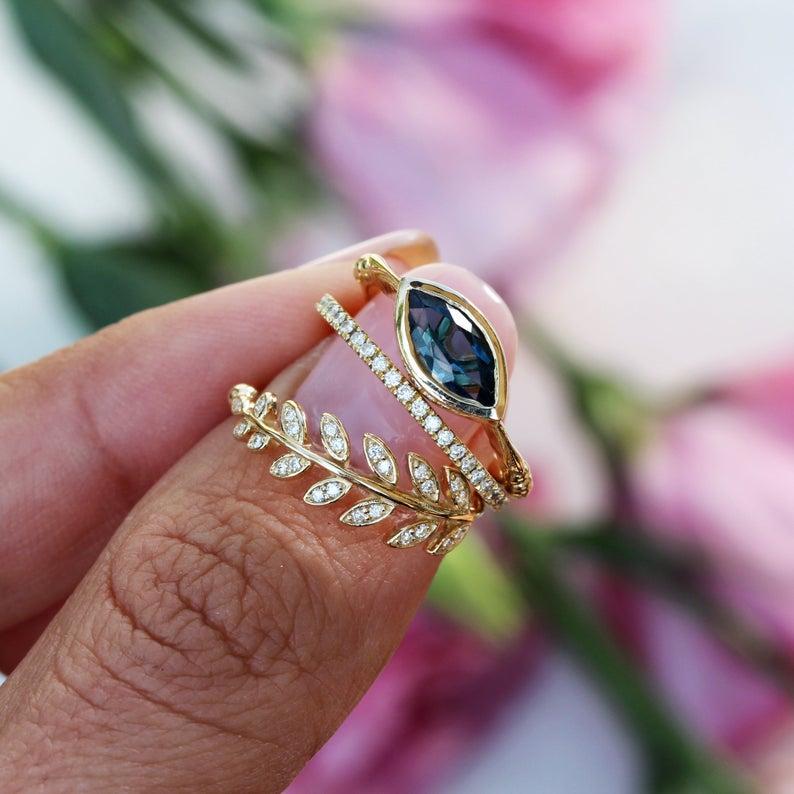 East-West Marquise Bezel Set Blue Topaz Eye Ring - Illuminati.
Blue Topaz is November's birthstone.
* The list is for the engagement ring only.
Hand made with care. 
An original design by Silly Shiny Diamonds. 

Details: 
* Center Stone Shape: