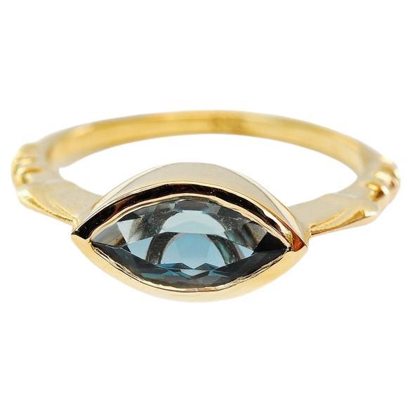 East West Bezel Set Blue Topaz Marquise Solitaire Engagement Ring - Illuminati For Sale