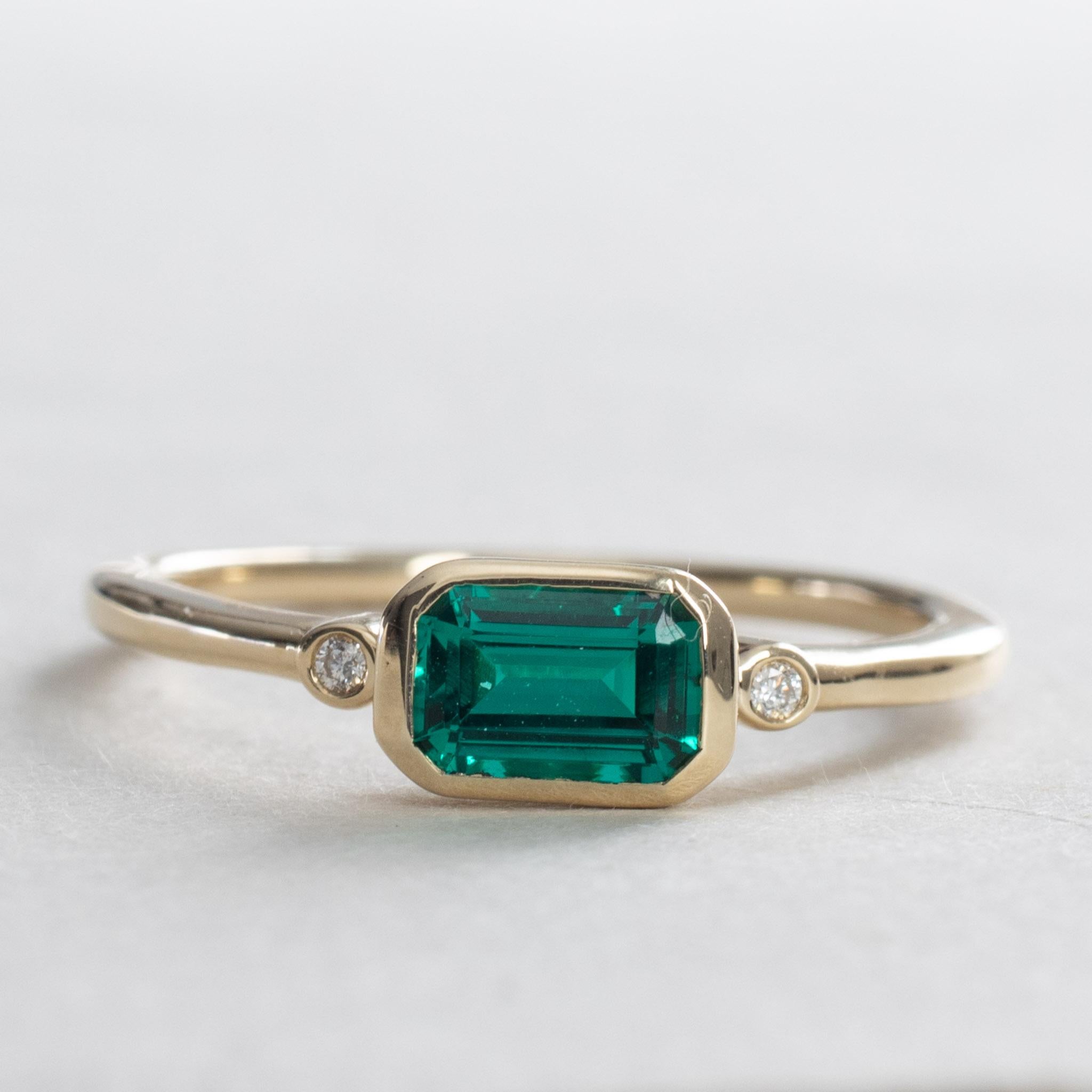 Art Deco East West Emerald with Diamond Engagement Ring