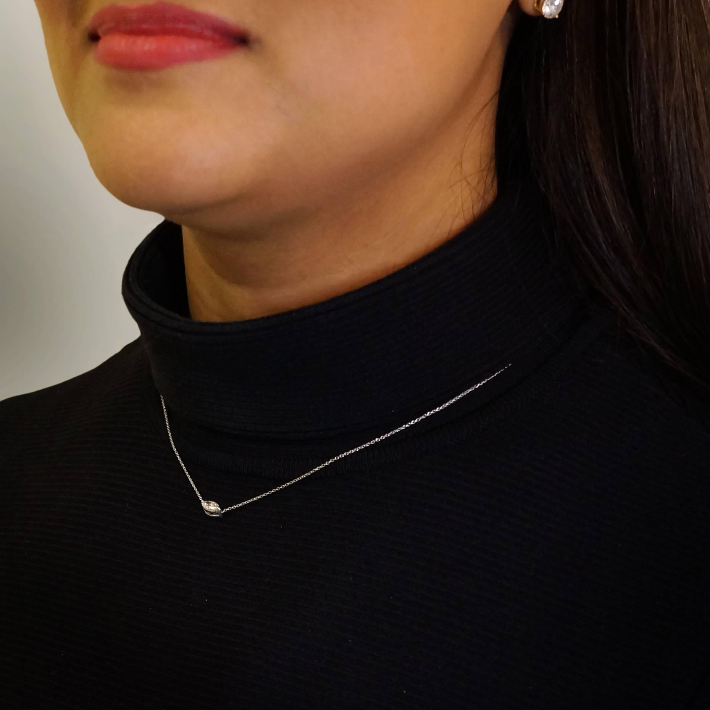 Simple yet elegant, Ri Noor's East West Marquise Diamond Solitaire Necklace sparkles as the intricate cuts of the stones reflect light. The necklace features a marquise diamond set in 18k white gold. Designed to transition from day to night, the