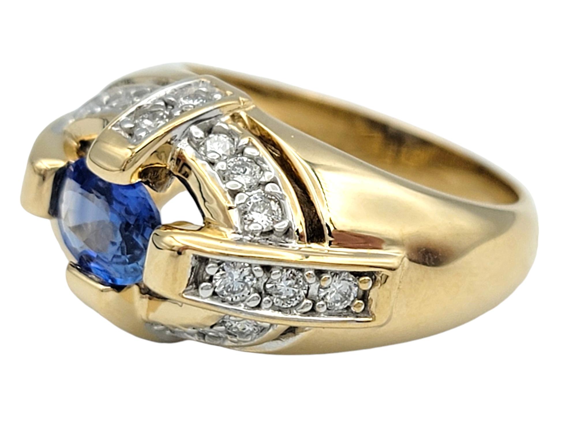 East-West Oval Cut Blue Sapphire Dome Ring with Diamonds in 14 Karat Yellow Gold For Sale 1