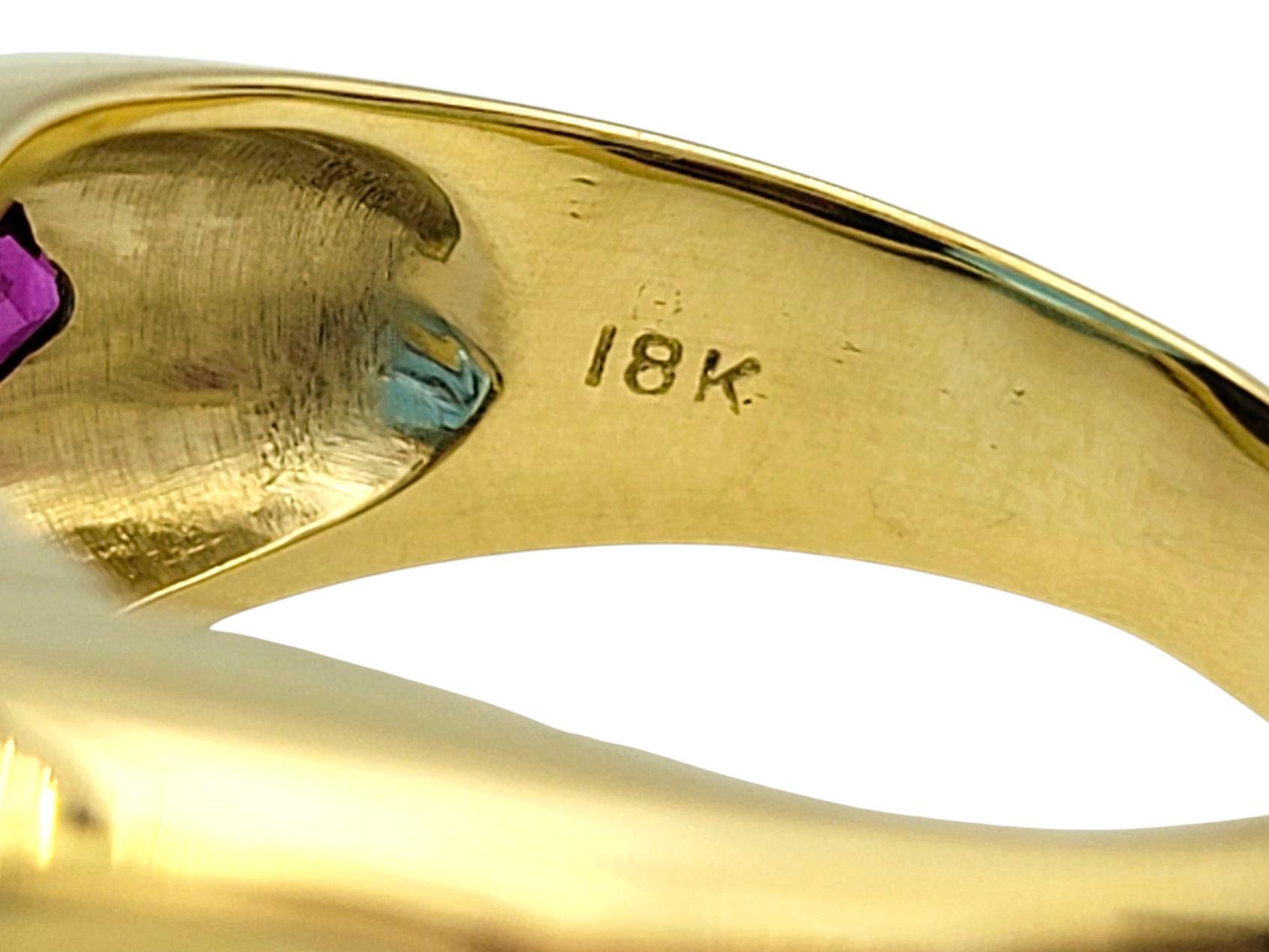 East West Oval Cut Blue Topaz Cocktail Ring with Rubies in 18 Karat Yellow Gold For Sale 2