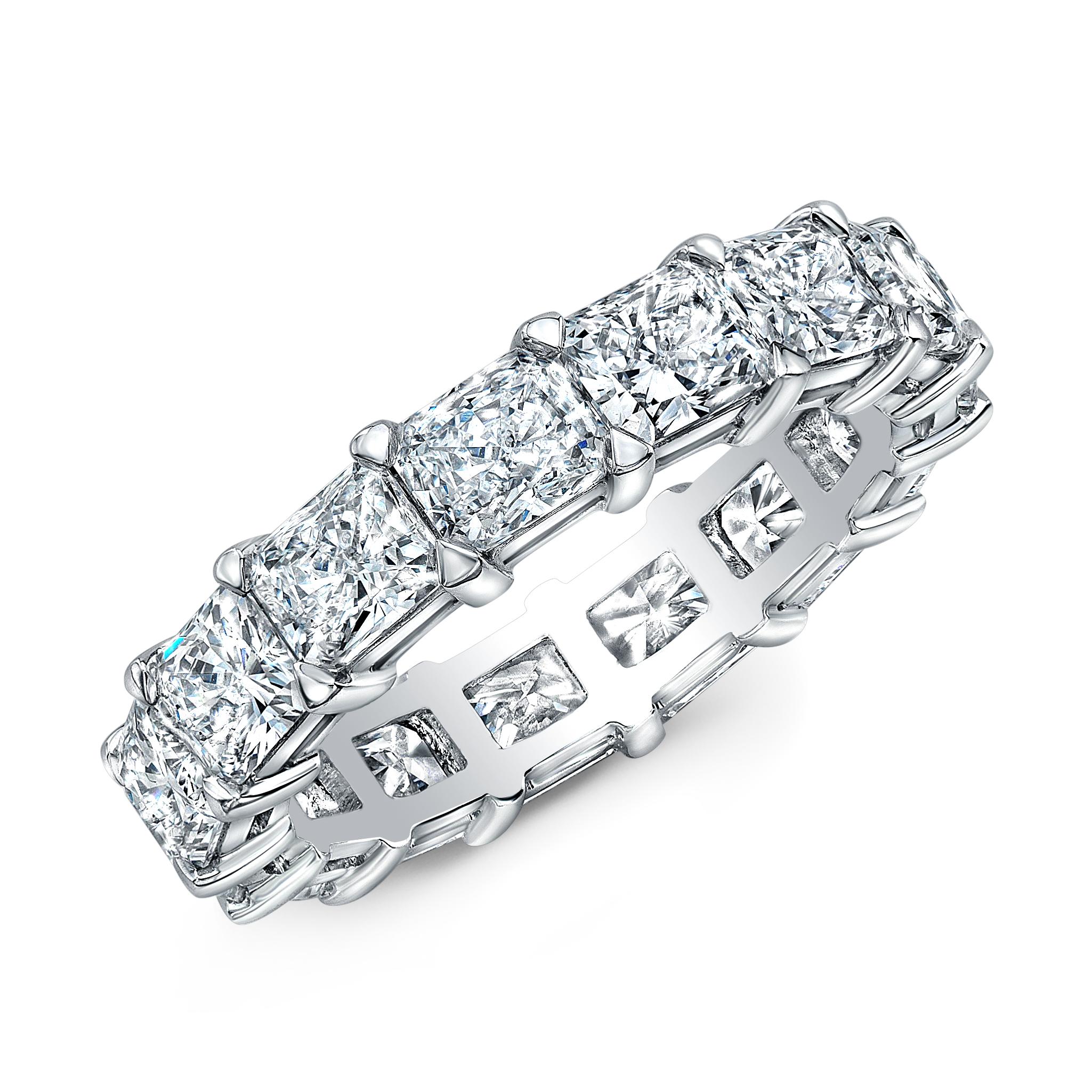 15 Radiant Cut Diamonds in an East-West setting eternity band.
18k white gold
5.05 carats total weight 
Ring size 6.5
Approximate Color F Clarity VS
