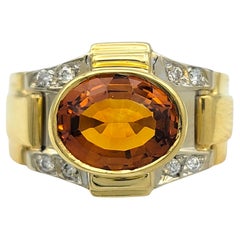 Bague en or bicolore 18 carats ornée de citrines ovales et de diamants