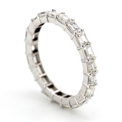 East-West Style Eternity Band with Emerald Cut Diamonds. D2.88ct.t.w.