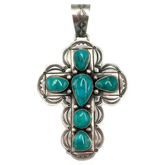 Colgante cruz de plata de ley con turquesa azul de Pascua de Paul Begay
