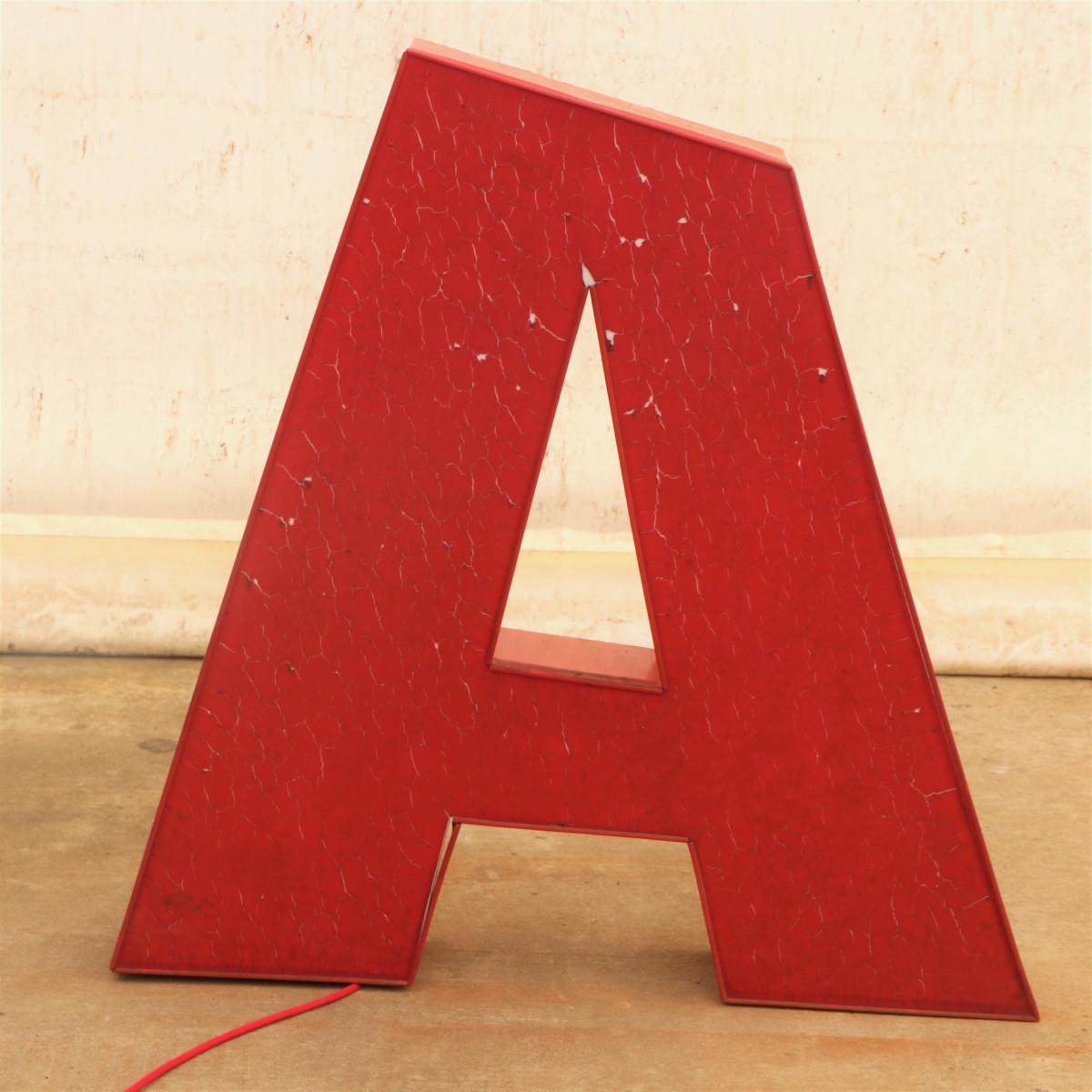 This advertising illuminated letter represents the ever so popular Vintage wall art. You can use the letter on the wall but better as a floor lamp in the room. The lamp shines in darkness or semi darkness.
This vintage industrial illuminated letter