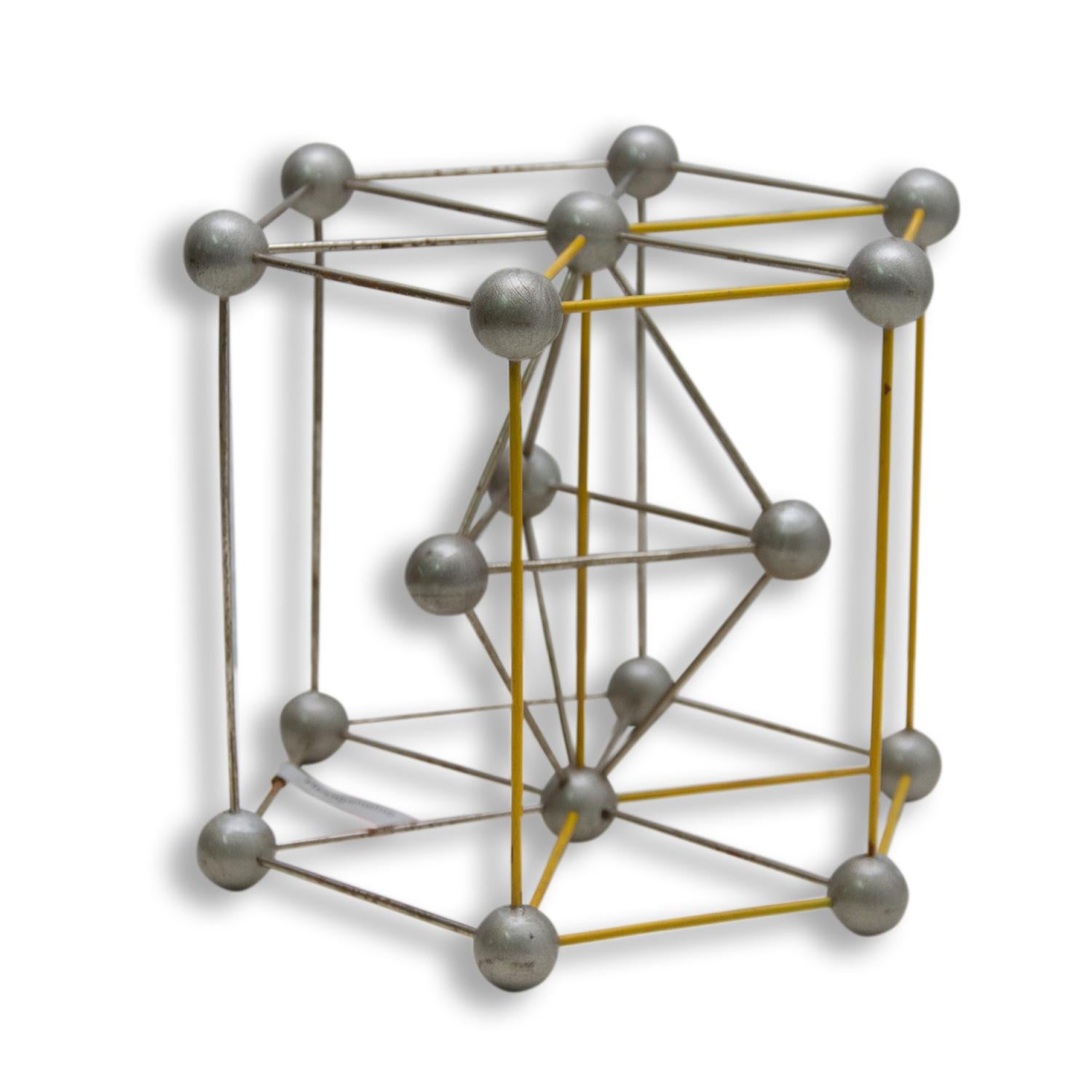 Vintage chemistry model of a Graphite Crystal

This beautiful metal 1950s molecular structure was used in a school in Prague (Czech Republic) in the 1950s and 1960s.

This is an authentic vintage item with great character and
