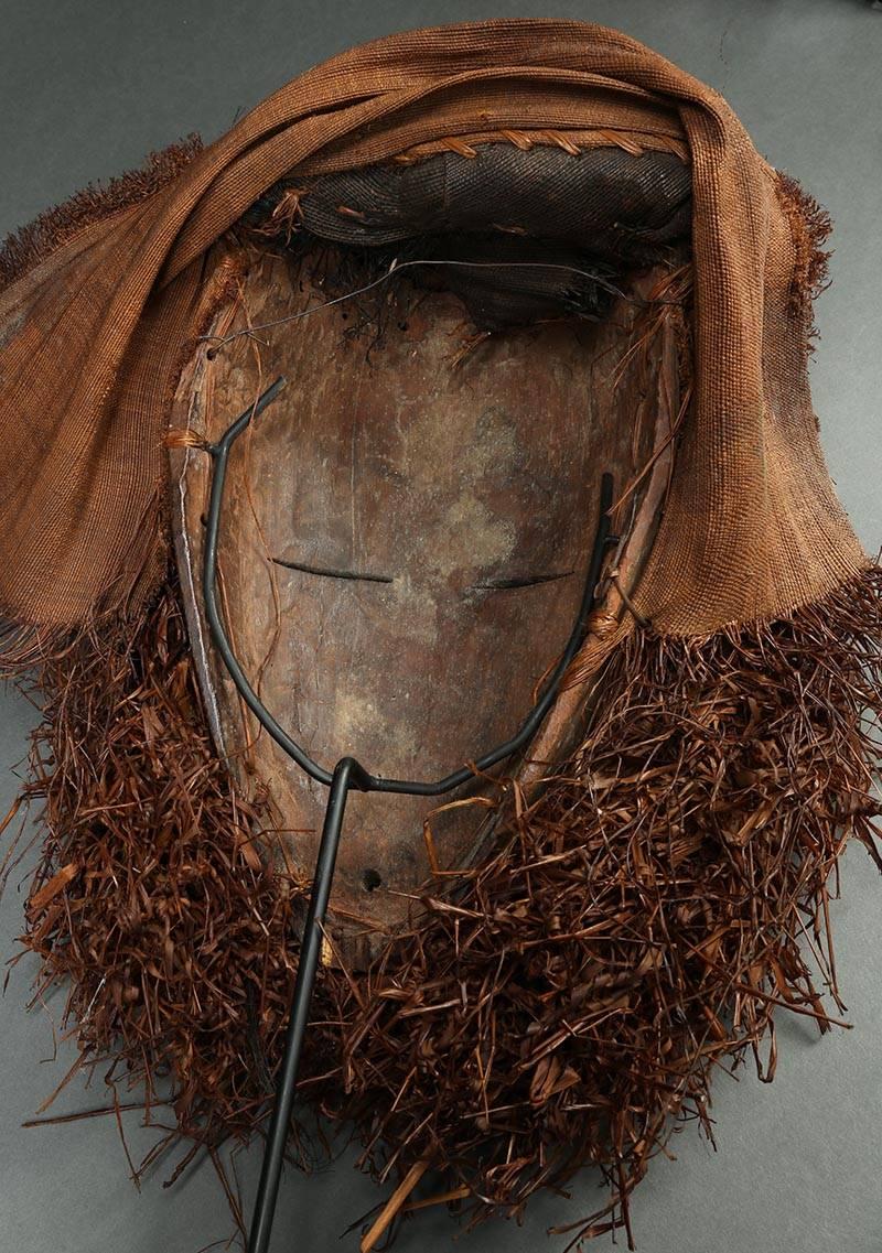 Offered by Scott McCue
Eastern Pende tribal mask with raffia, Democratic Republic of Congo

Eastern Pende mask with large eyes and long nose, remains of yellow pigments, heavy signs of use inside. About 16 inches high with raffia, custom metal