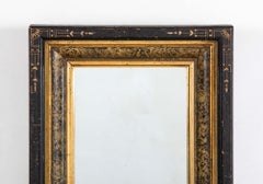 Eastlake Ebonized Giltwood And Faux Marble Frame Mirror With Incised Decoration