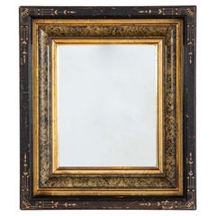 Eastlake Ebonized Giltwood And Faux Marble Frame Mirror With Incised Decoration