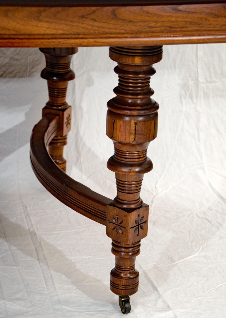 Eastlake Victorian Walnut Dining Table with Two Leaves For Sale at