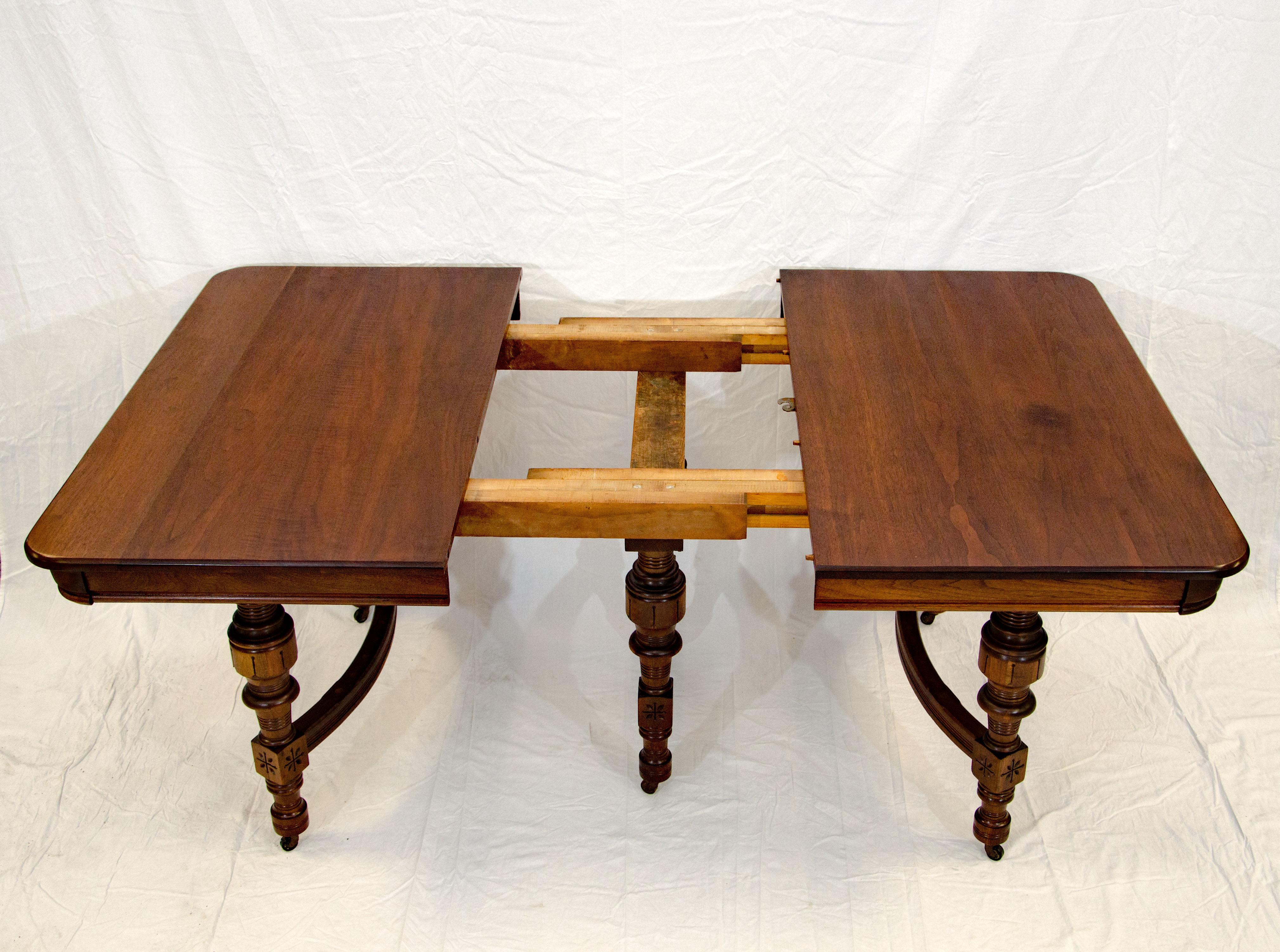 Eastlake Victorian Walnut Dining Table with Two Leaves For Sale 10