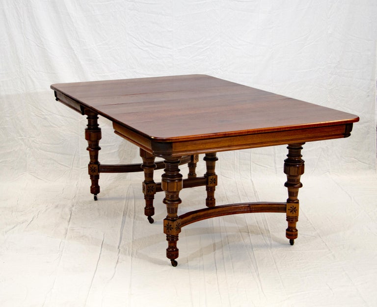 Eastlake Victorian Walnut Dining Table with Two Leaves For Sale at