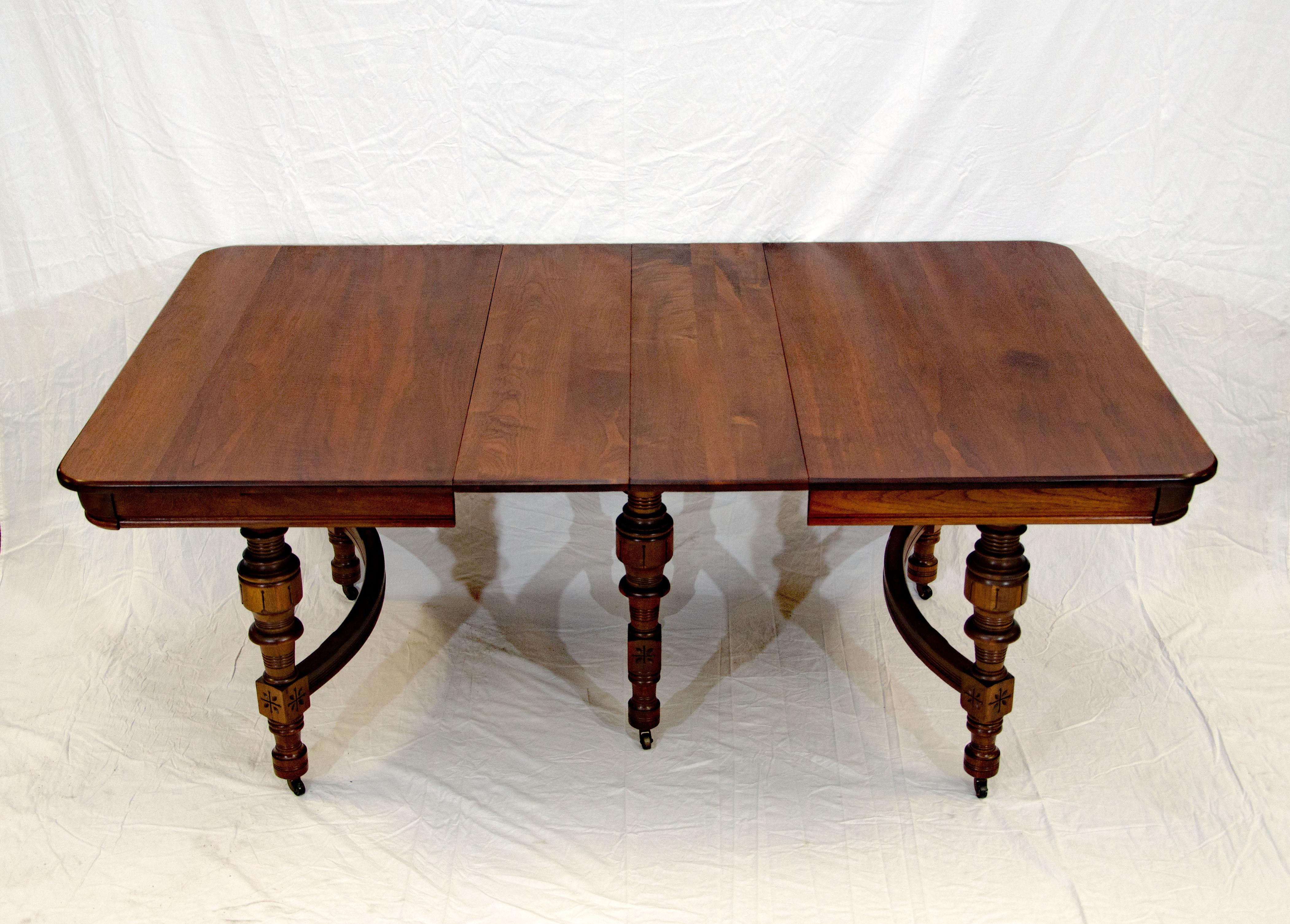 American Eastlake Victorian Walnut Dining Table with Two Leaves For Sale