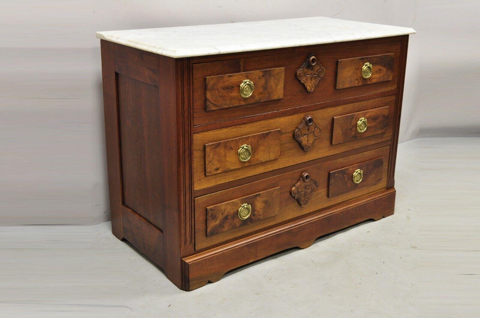 Antique Eastlake Victorian white marble top burl walnut 3 drawer commode dresser chest. Item features a white marble top, beautiful wood grain, 3 drawers, very nice antique item, quality American craftsmanship. Circa 19th century. Measurements: 29