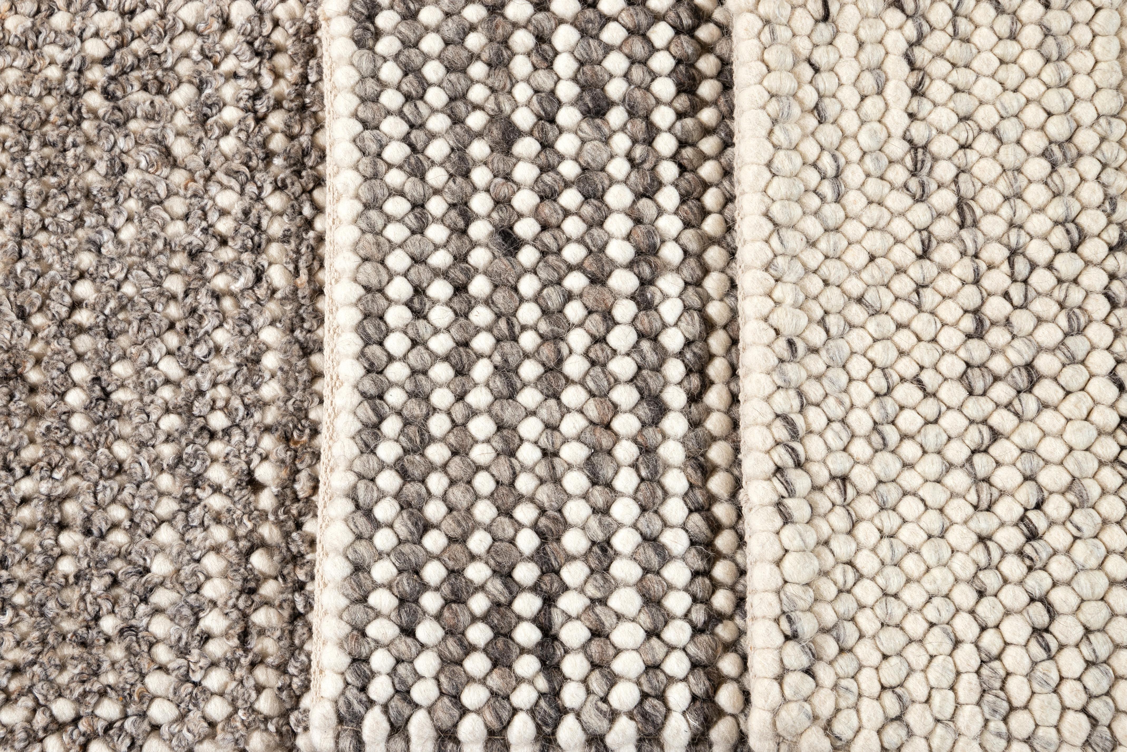 Solid-colored woven wool textured custom rug in varying neutral shades. Custom sizes and colors made to order.

Collection: Easton
Material: 100% wool
Lead Time: Approximate 12 weeks
Available colors: Greige, grey, Lt. Silver
Made in