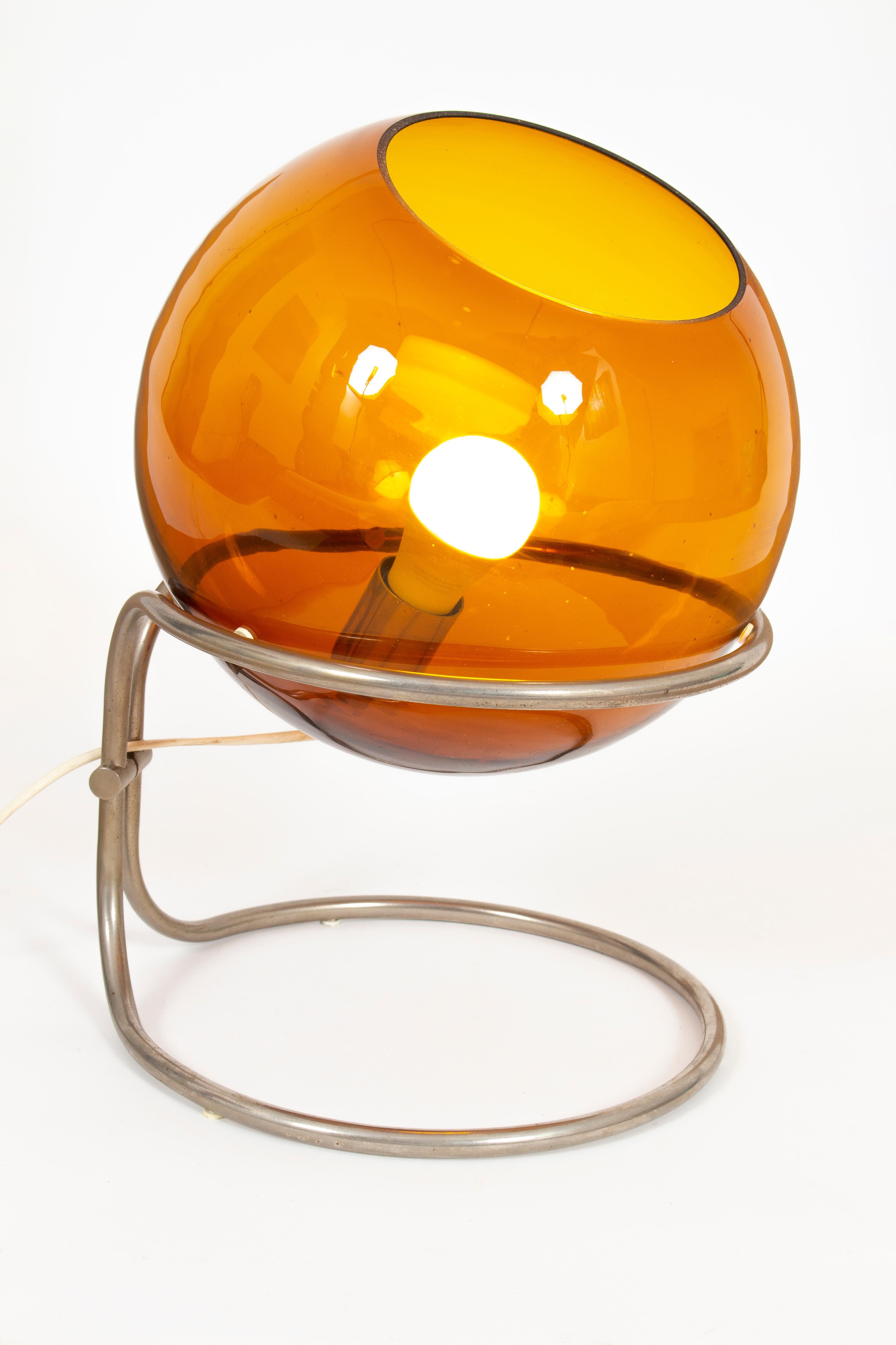 Tibor Házi (1946-1993) was a renowned Hungarian glass artist, who has excelled especially as a lamp designer.
The bowl shaped lamps with unique pipe structures mark his signature pieces. The bowl shaped lamps are designed to scatter the light