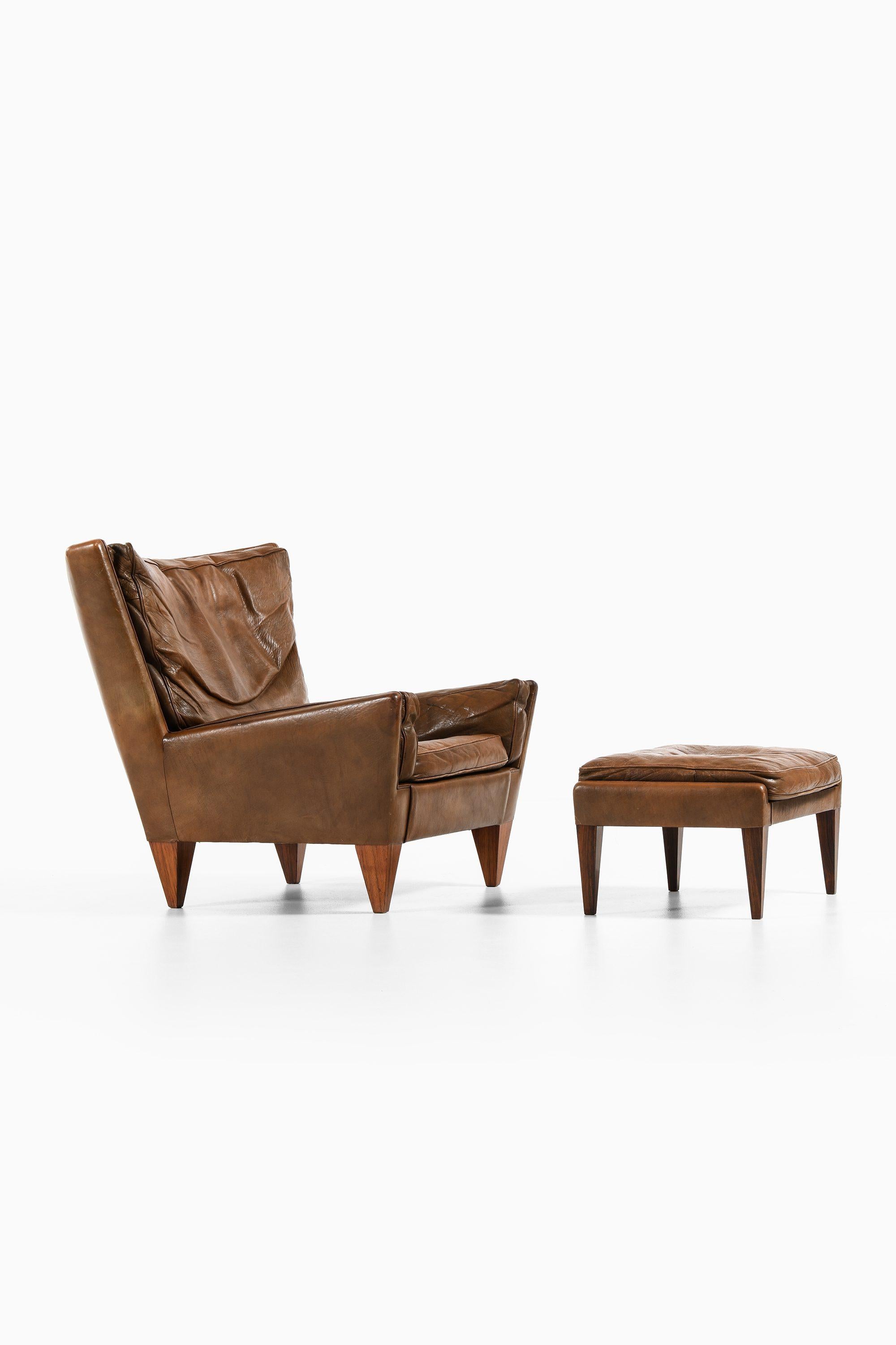 Sessel und Hocker aus Palisanderholz mit braunem Leder von Illum Wikkelsø, 1960er Jahre (Skandinavische Moderne) im Angebot