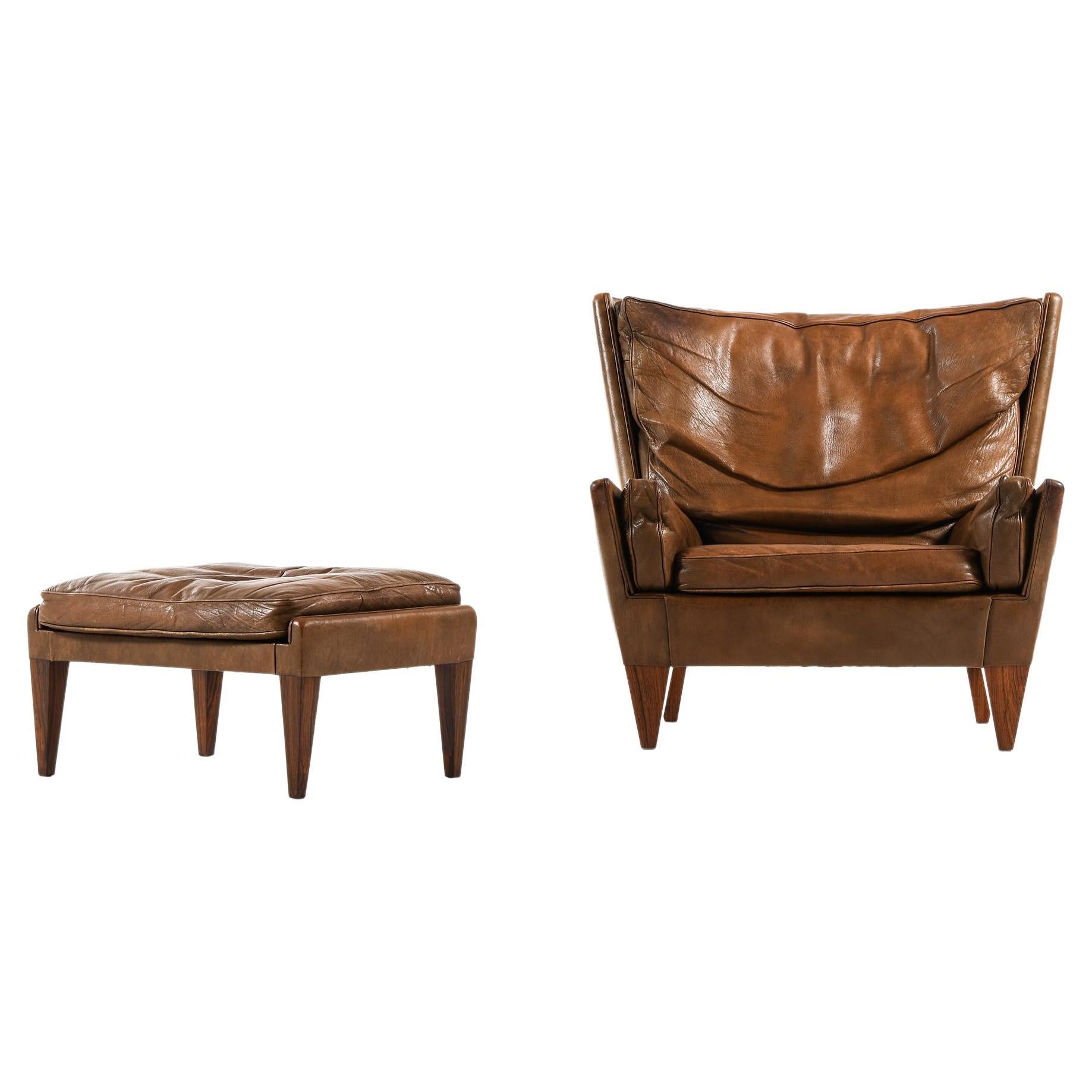 Fauteuil et tabouret en bois de rose et cuir Brown par Illum Wikkelsø, années 1960