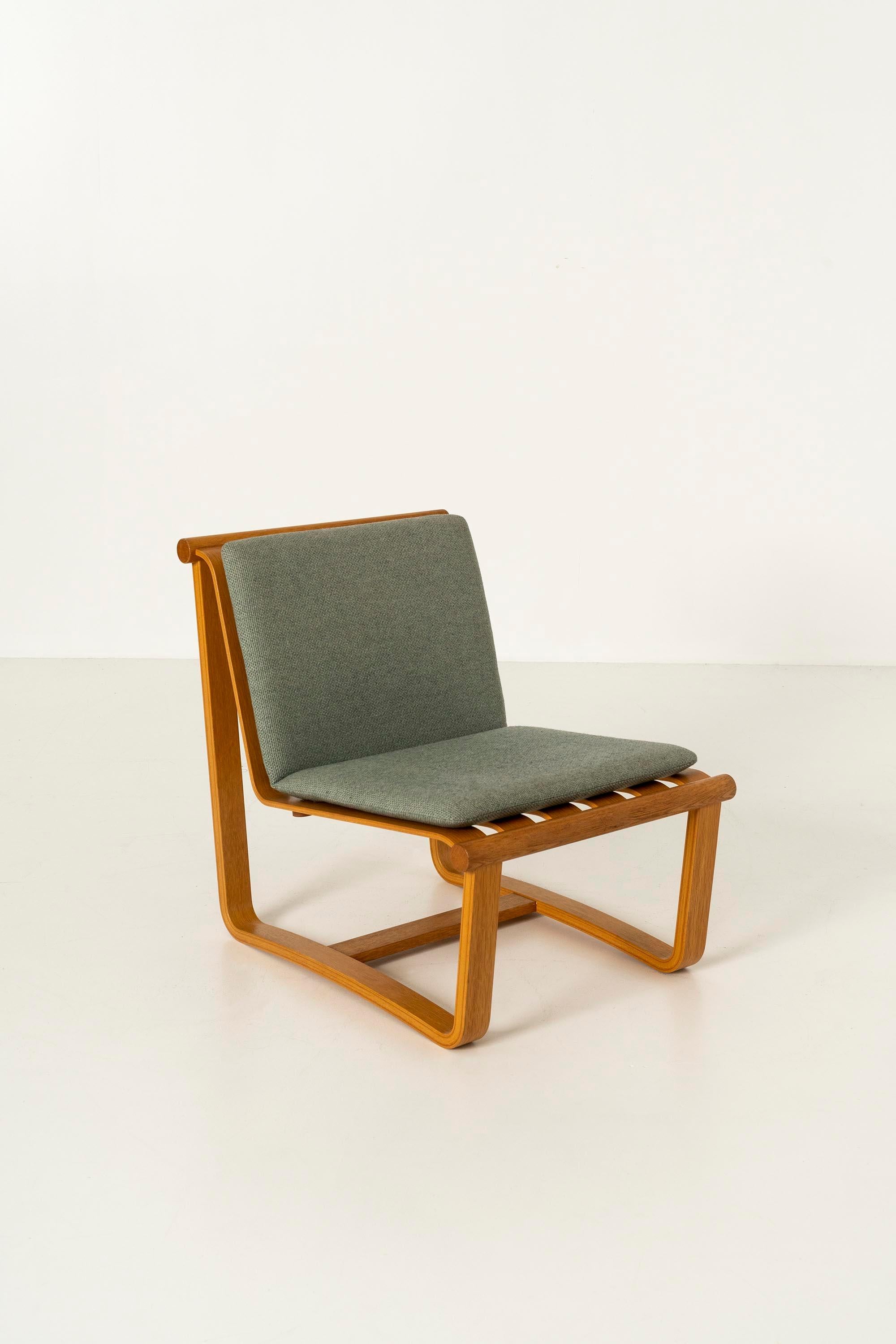 Easy chair model T-5510 in oak and fabric by Katsuo Matsumura. 

Katsuo Matsumura, one of Japan's top furniture designers, created the T-5510 easy chair in 1968 for Tendo Mokko. This piece shows his speciality in designing chairs that fit the
