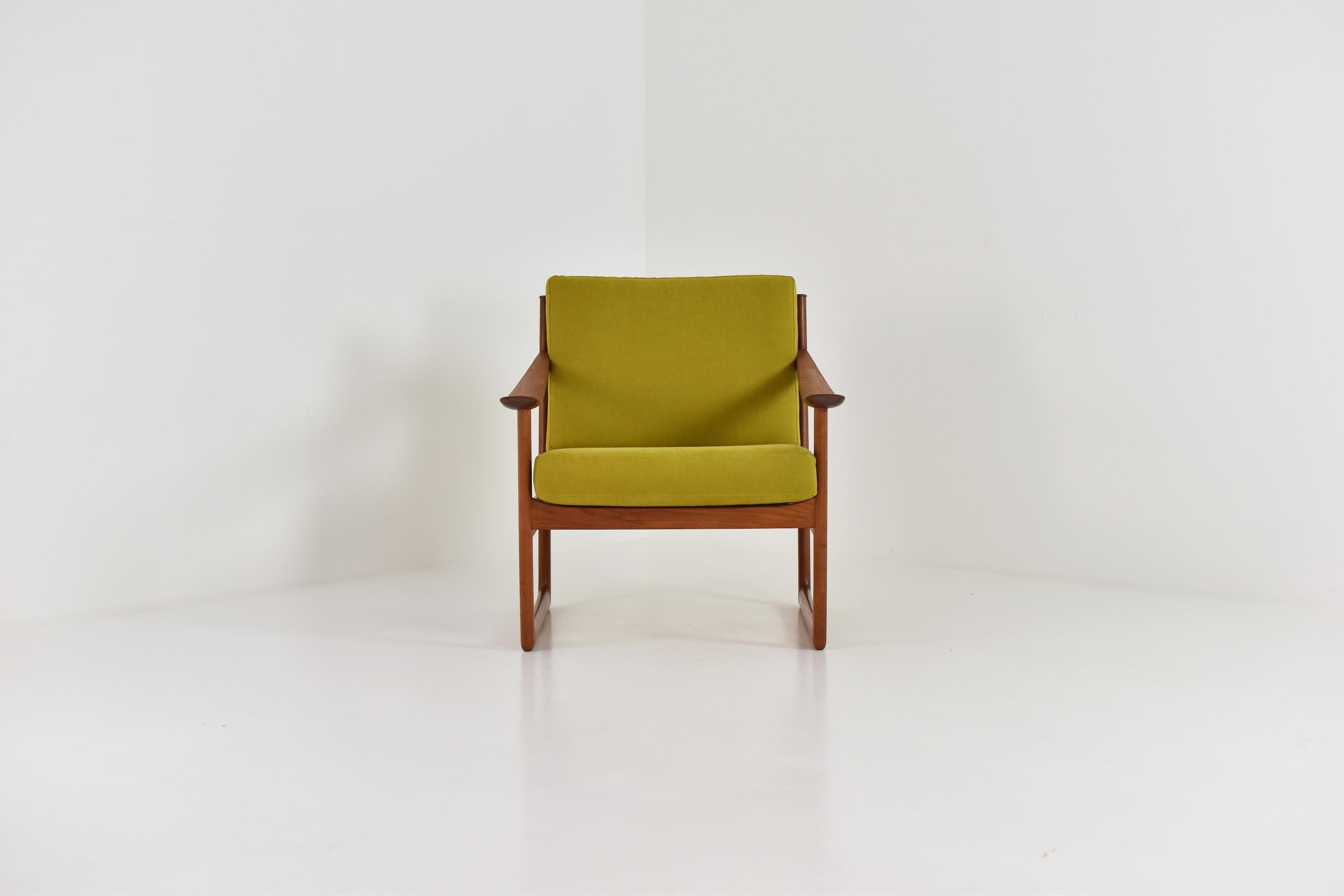 Easy chair by Peter Hvidt and Orla Molgaard-Nielsen for France & Søn, Denmark 1960’s. This is model FD130 made out of teak and the cushions has been professionally re-upholsterd in a mosterd green fabric. Labeled.