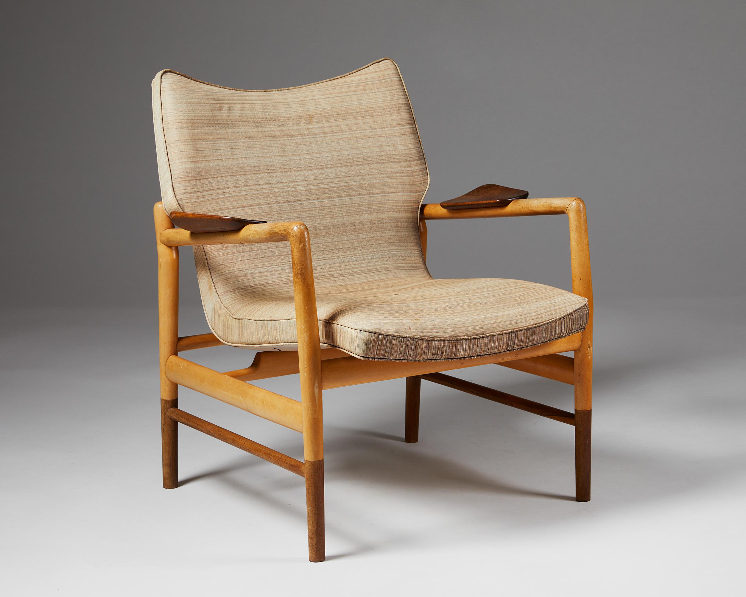 Easy chair designed by Ib Kofod-Larsen for Christensen & Larsen Cabinetmakers,
Denmark. 1949.
Maple, Brazilian rosewood with horsehair fabric.

Provenance: Percy von Halling-Koch, hence by descent in the family.
Model presented at The