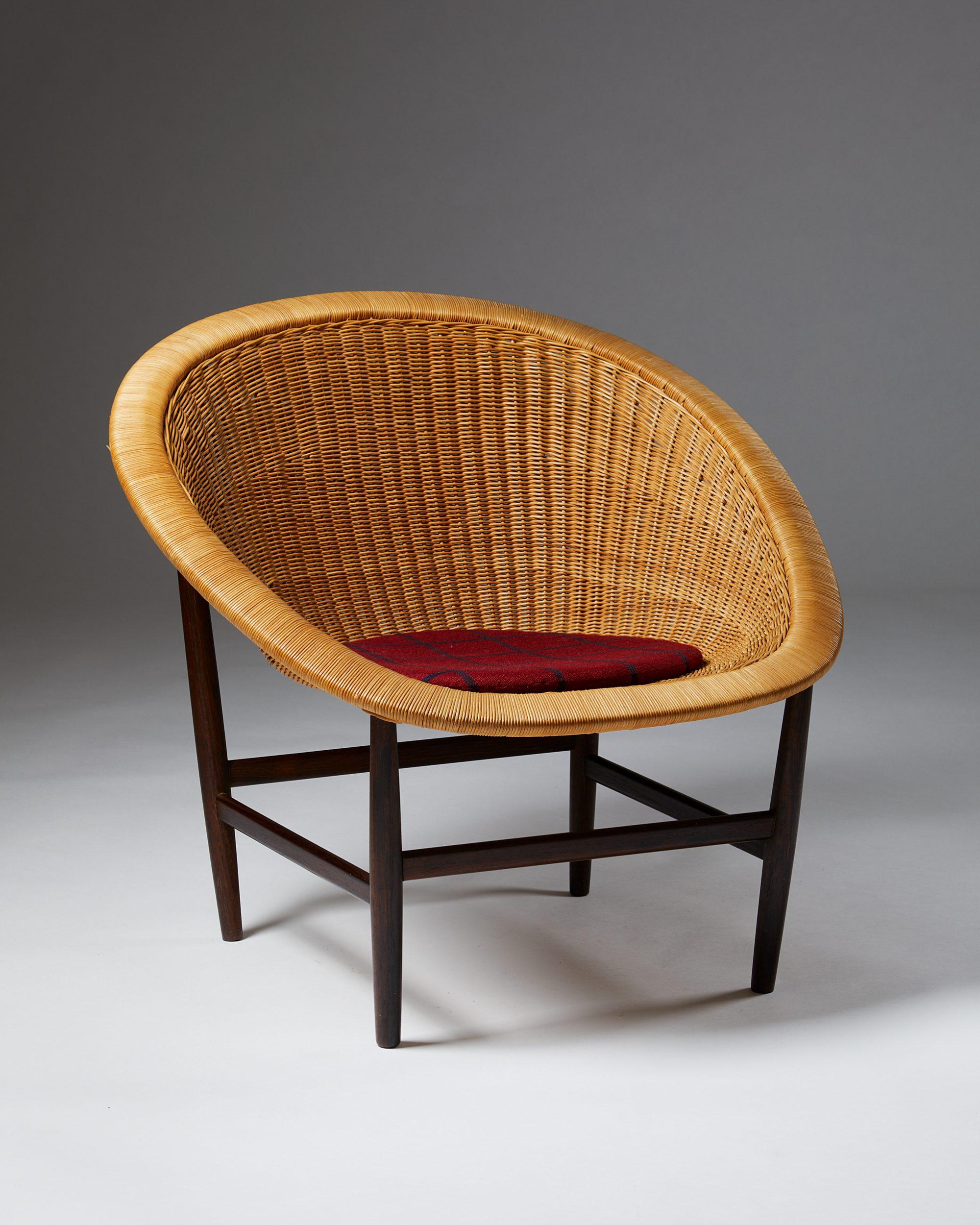Easy chair designed by Nanna Ditzel for Ludvig Pontoppidan,
Denmark, 1950s.

Exceptionally rare model with a Brazilian rosewood frame.
Woven cane, Brazilian rosewood, and wool cushion.

Dimensions: 
H: 75 cm/ 2' 5 1/2
