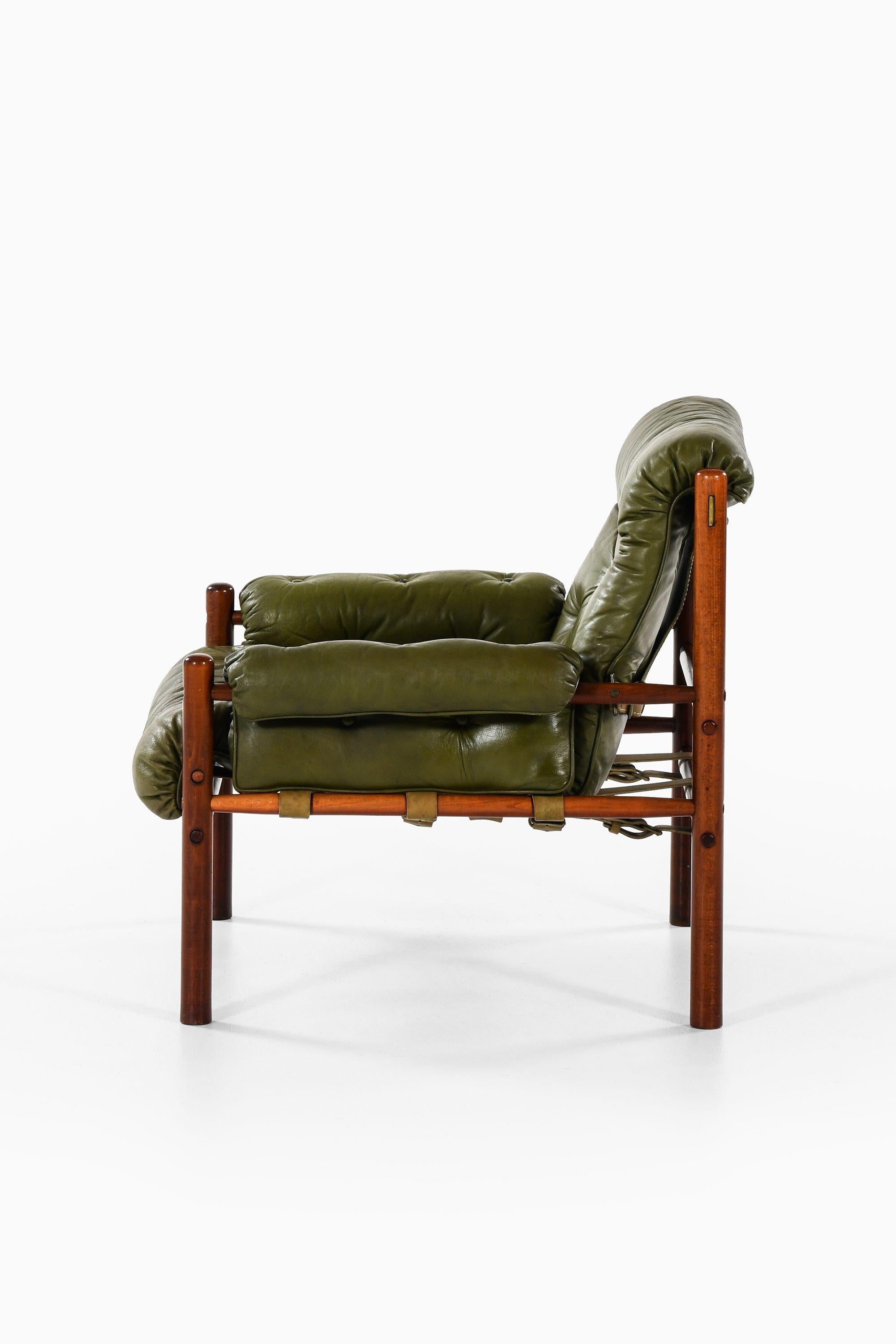 Easy Chair in Beech and Leather by Arne Norell, 1960s

Additional Information:
Material: Dark stained beech, original green leather and brass
Style: midcentury, Scandinavian
Produced by Arne Norell AB in Aneby, Sweden
Dimensions (W x D x H):