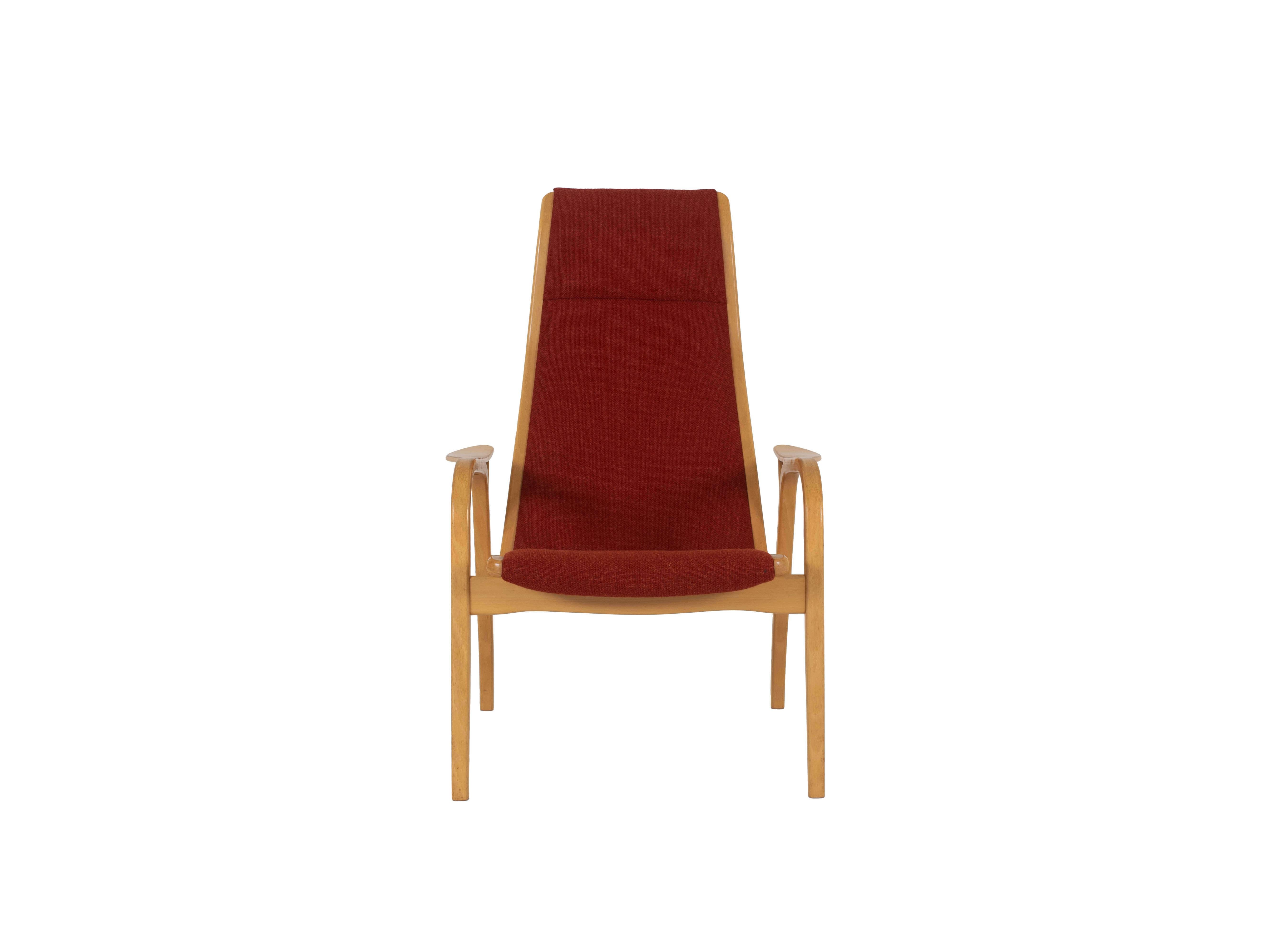 Nice easy chair by Yngve Ekström model Lamino from Sweden. The chair has a typical Scandinavian design and is executed in beech wood and red fabric. The design is from 1956, however, this chair is a later edition. The shape of the back is curved,