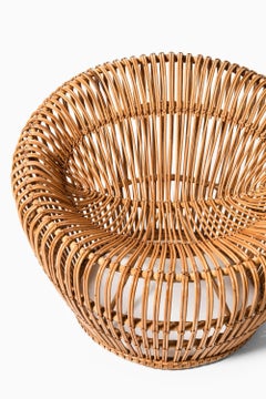 Fauteuil en rotin, tissu et osier, par Franco Albini, années 1950