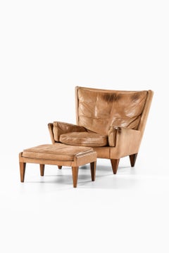 Fauteuil en cuir et bois de rose avec tabouret par Illum Wikkelsø, 1960s
