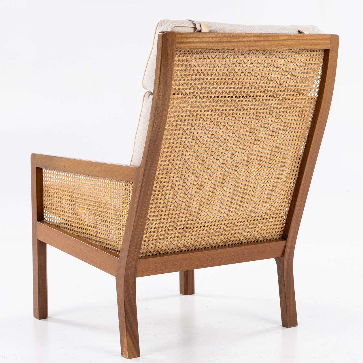 Easy chair in mahogany w. French cane and newer cushions in light textile. Bernt Petersen / Wørts Møbelsnedkeri