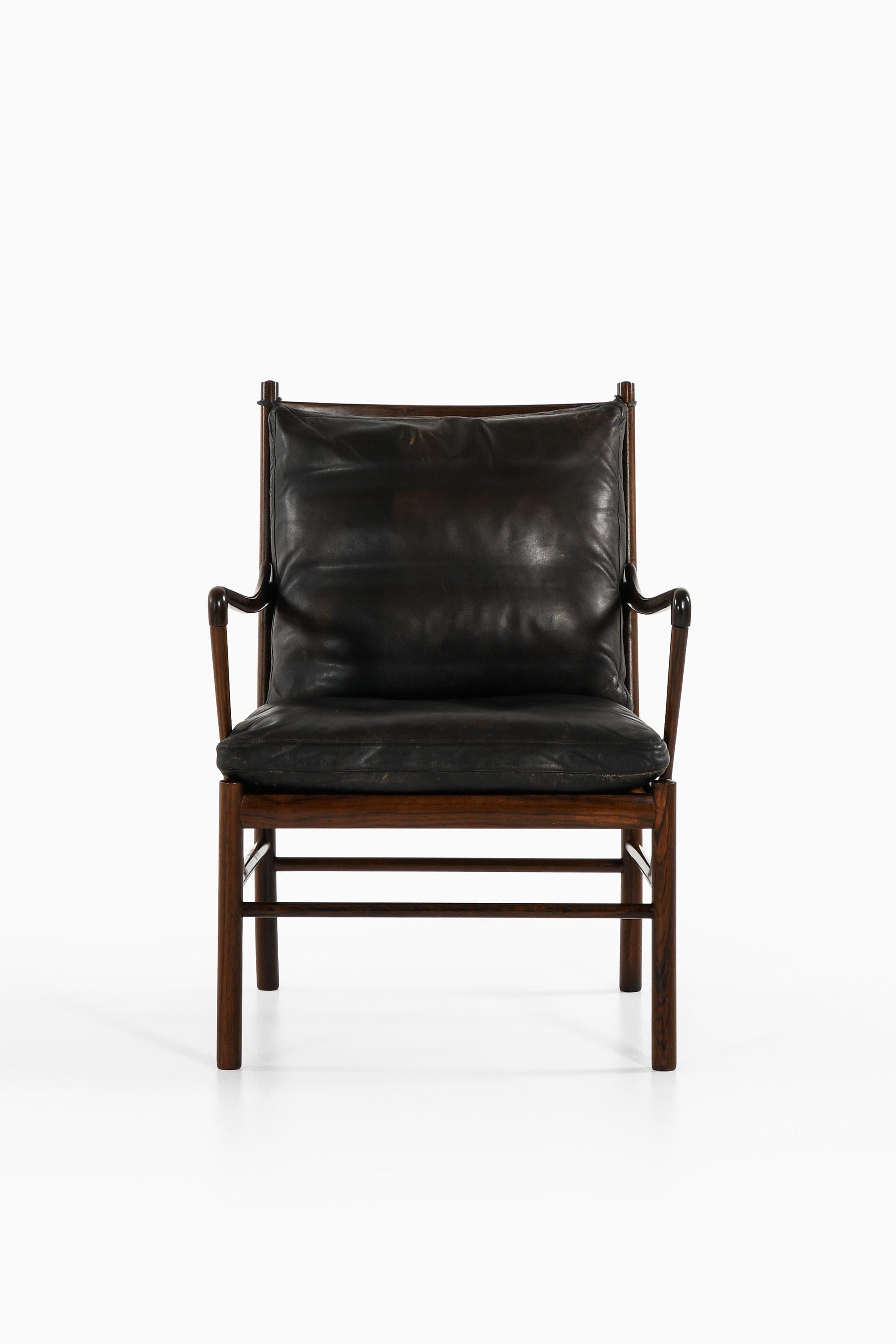 Easy Chair in Rosewood, Woven Cane and Original Leather by Ole Wanscher, 1960's For Sale 5