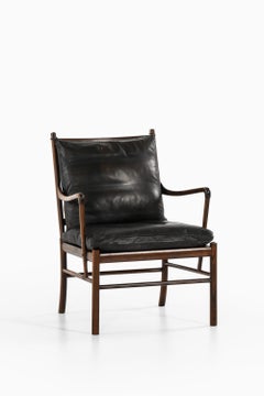Easy Chair in Rosewood, Woven Cane and Original Leather by Ole Wanscher, 1960's
