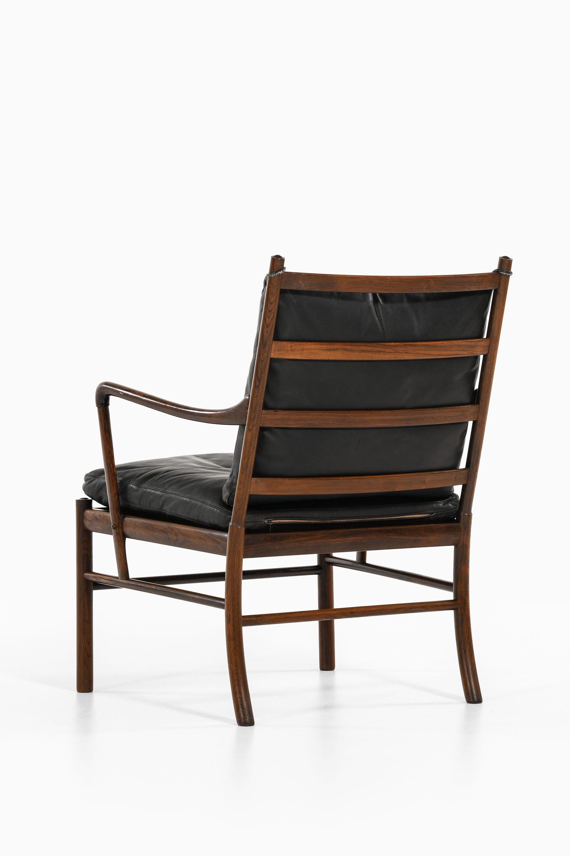 Scandinavian Modern Easy Chair in Rosewood, Woven Cane and Original Leather by Ole Wanscher, 1960's For Sale