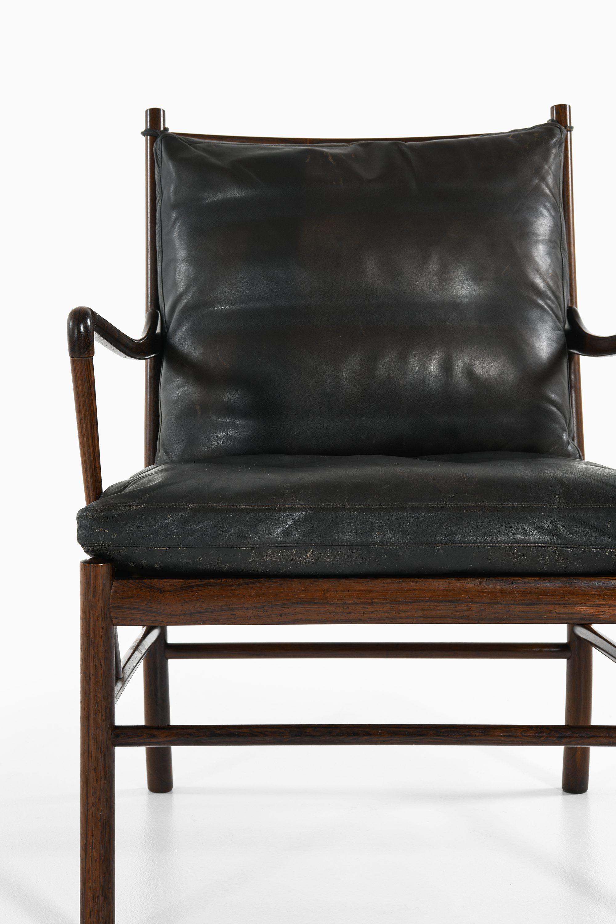 Danish Easy Chair in Rosewood, Woven Cane and Original Leather by Ole Wanscher, 1960's For Sale