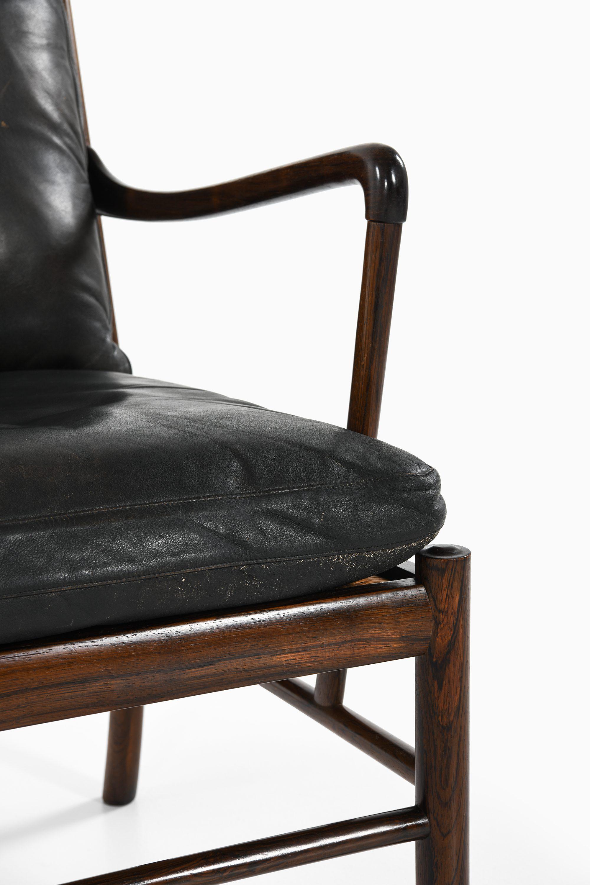 Easy Chair in Rosewood, Woven Cane and Original Leather by Ole Wanscher, 1960's In Good Condition For Sale In Limhamn, Skåne län