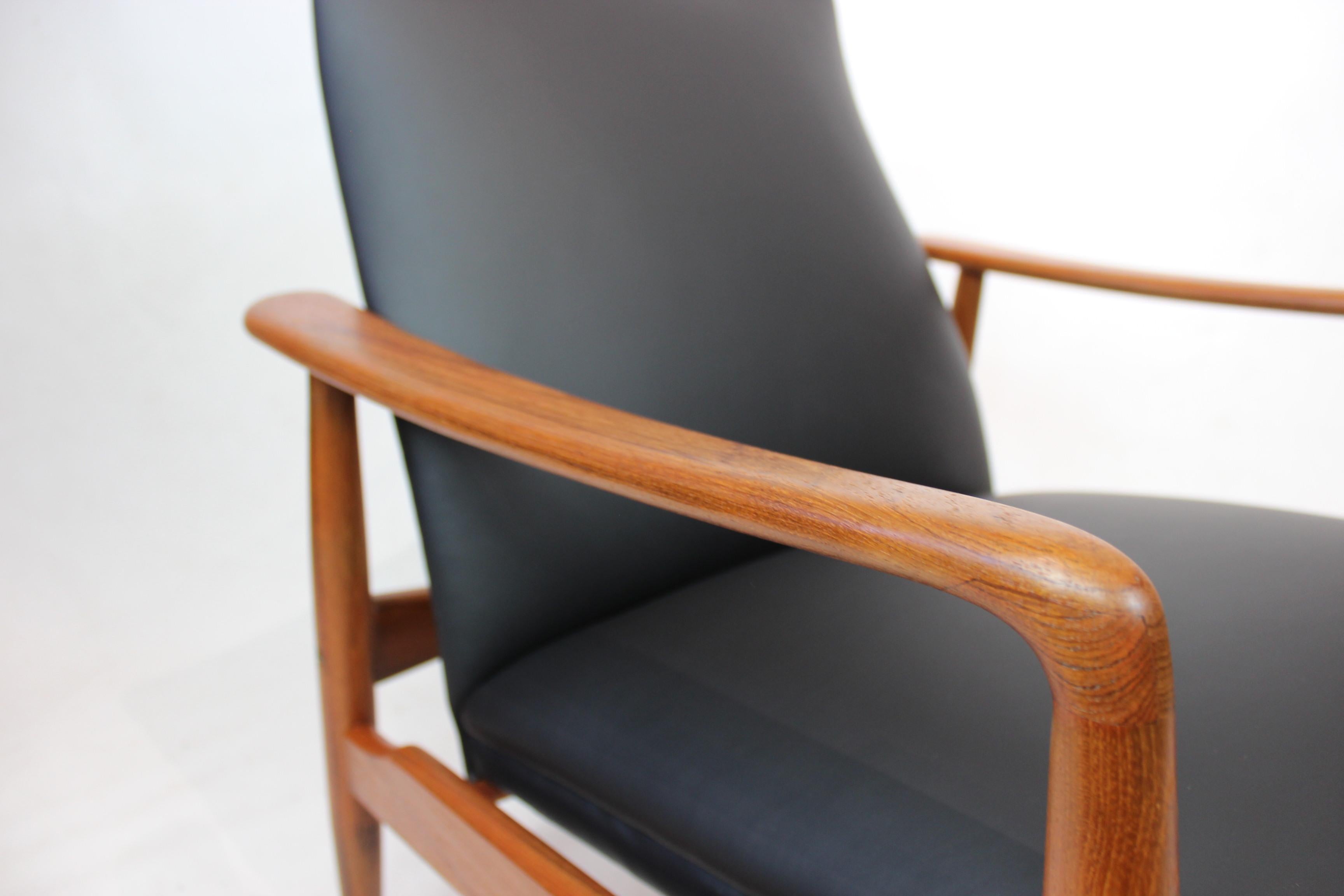 Danish Easy Chair in Teak and Black Leather Designed by Søren Ladefoged in the 1960s