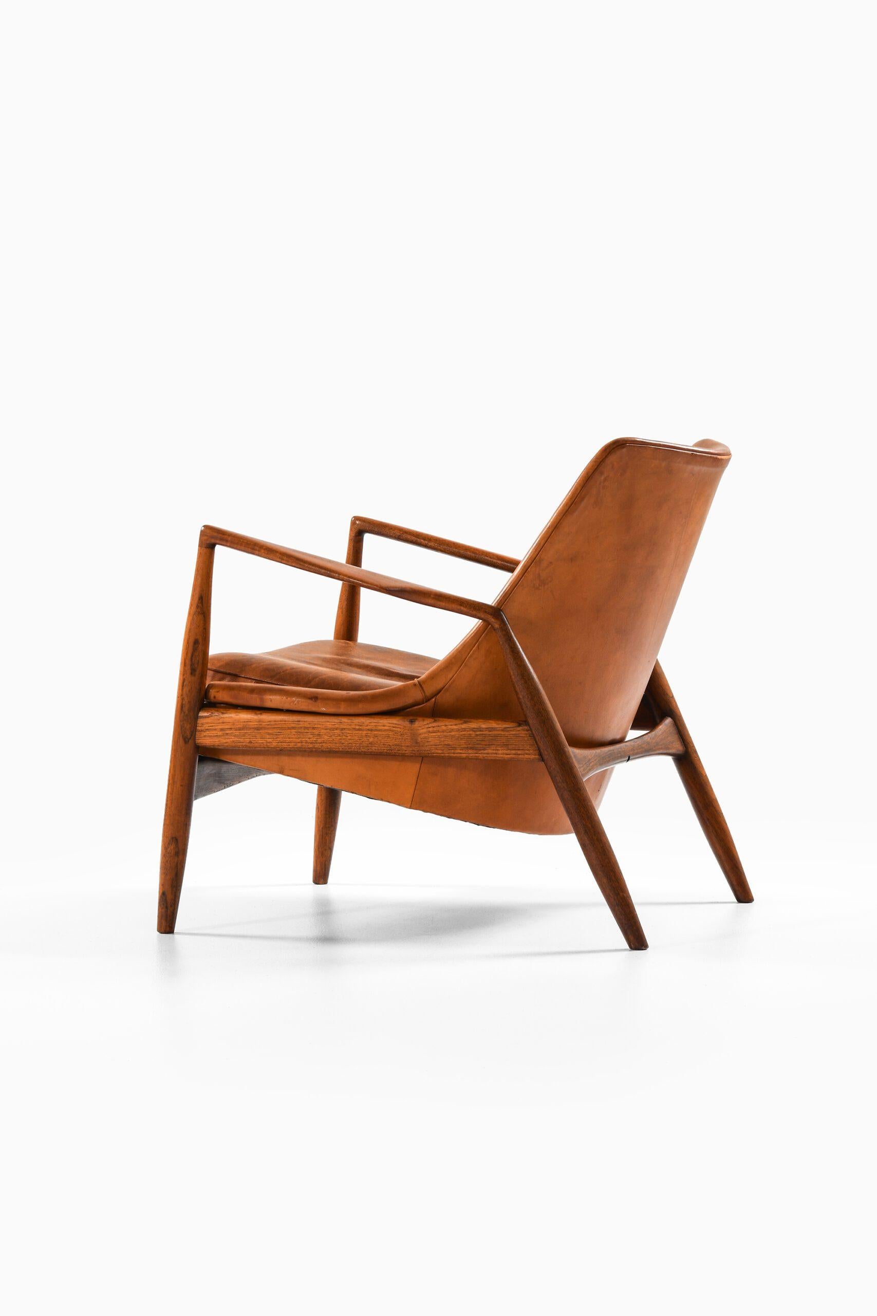 Fauteuil en teck et cuir cognac original par Ib Kofod-Larsen, années 1950 en vente 5