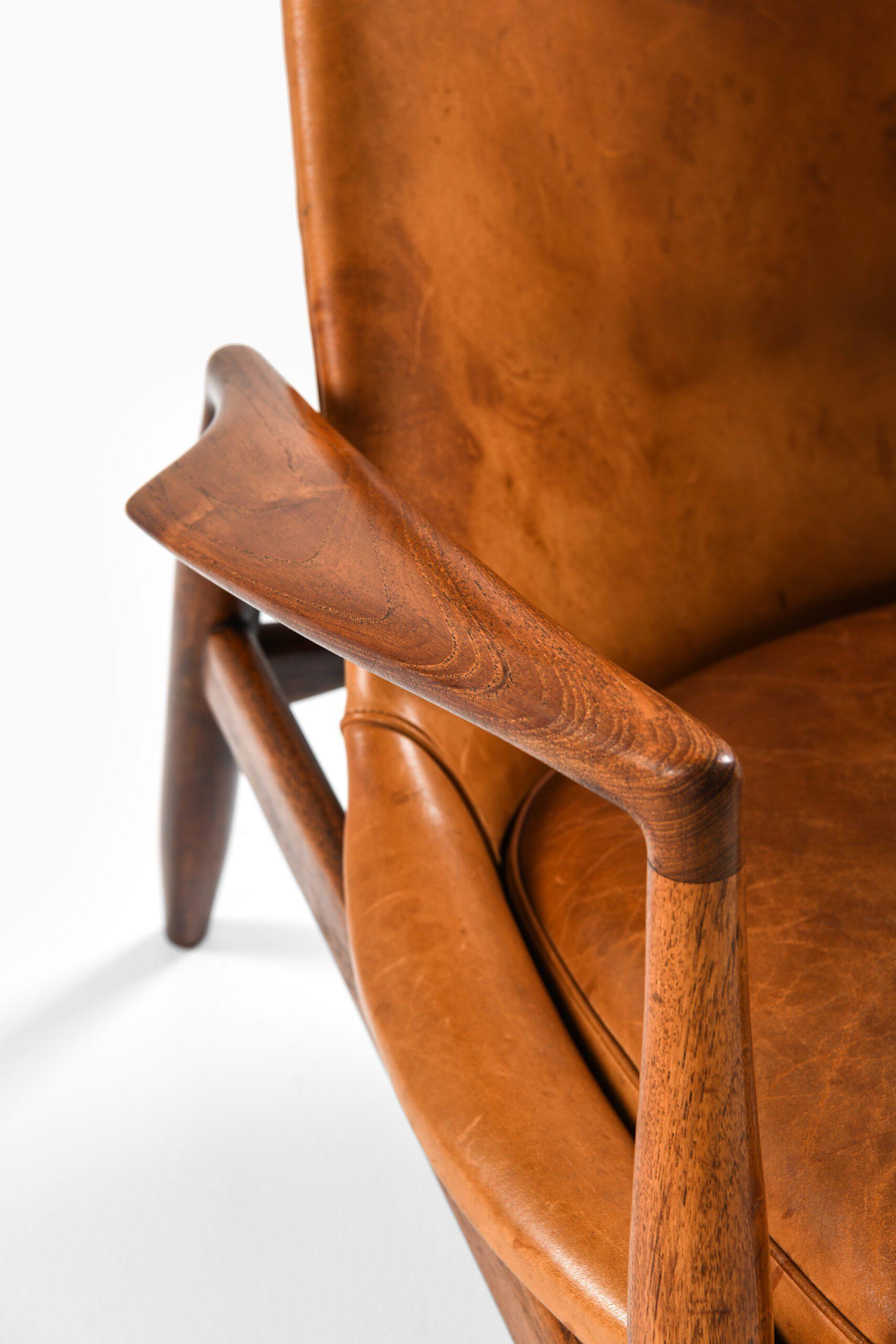 Fauteuil en teck et cuir cognac original par Ib Kofod-Larsen, années 1950 Bon état - En vente à Limhamn, Skåne län