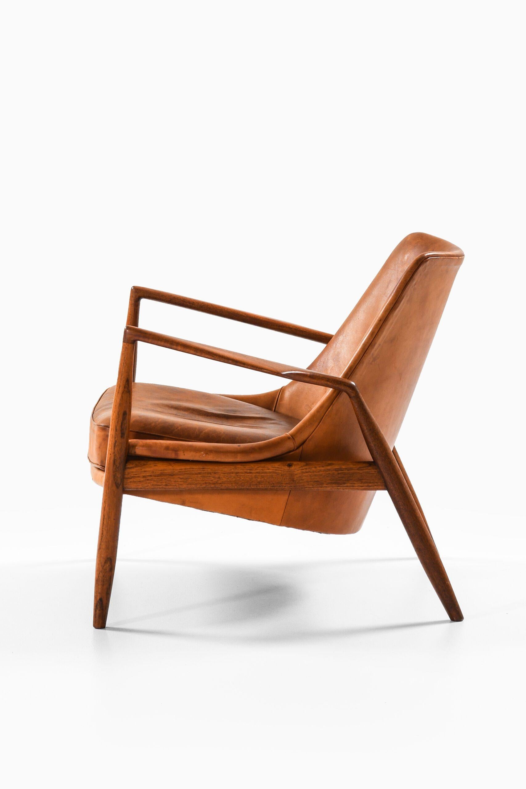 Fauteuil en teck et cuir cognac original par Ib Kofod-Larsen, années 1950 en vente 2