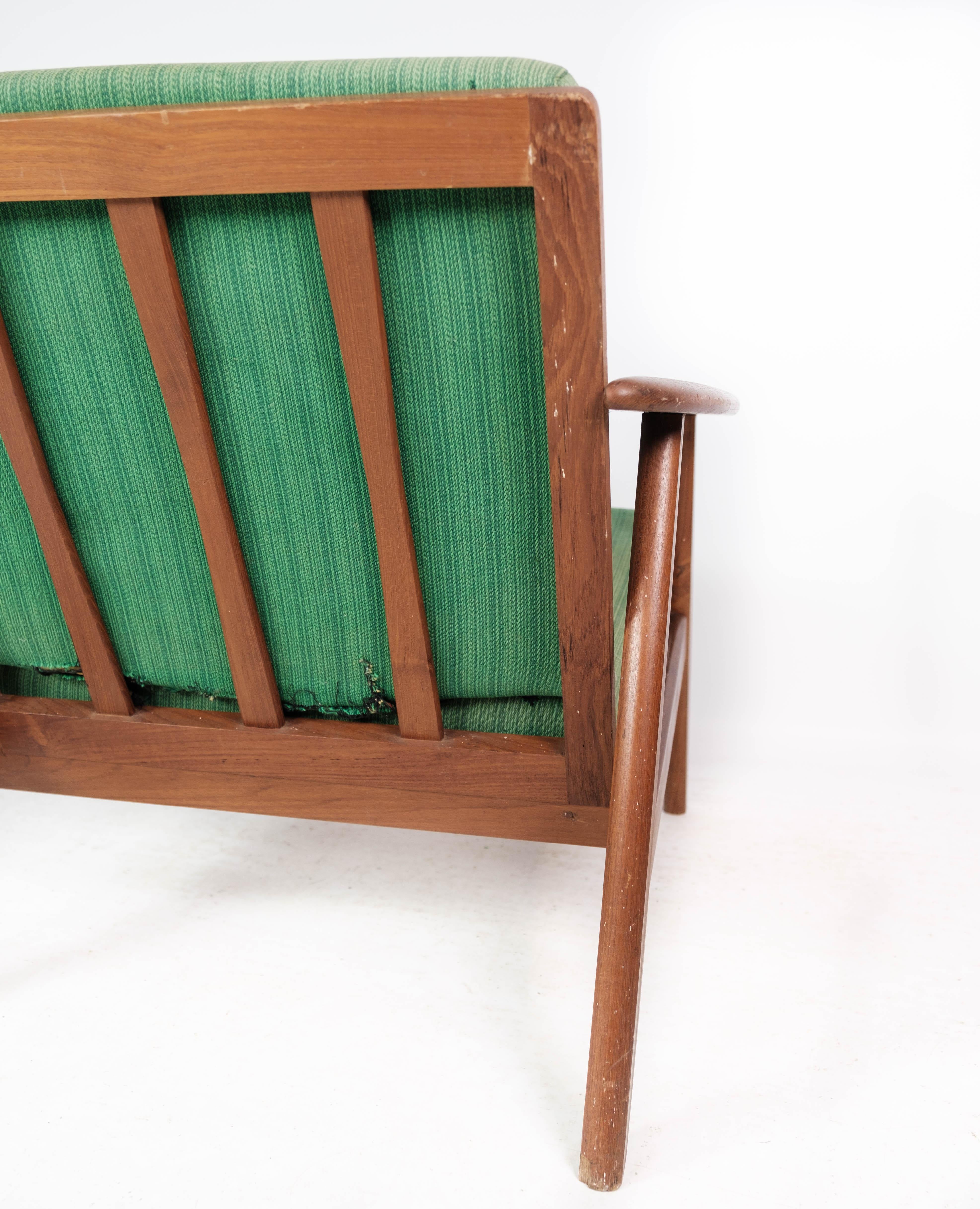 Fauteuil en teck et tissu d'ameublement vert de design danois des années 1960 en vente 4