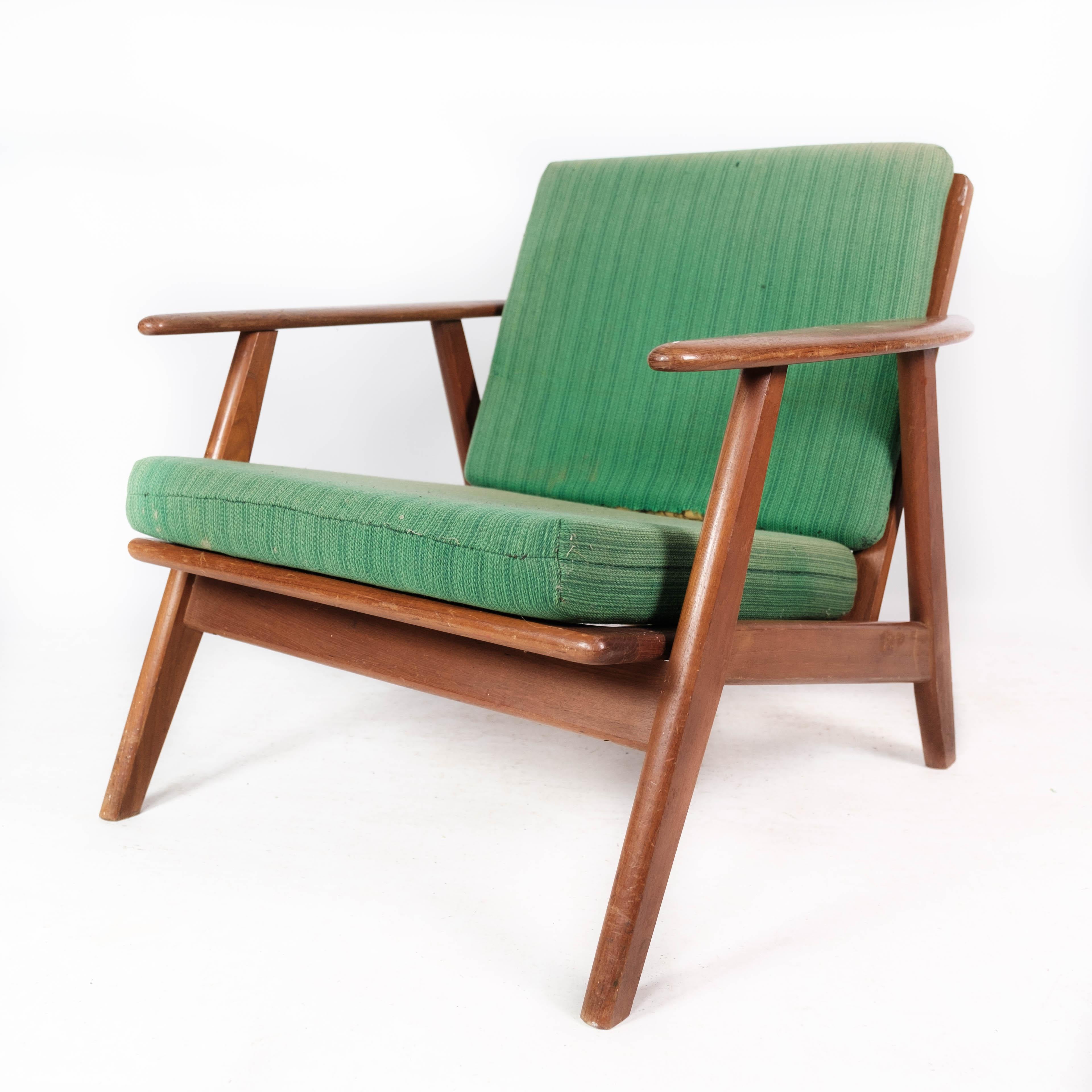 Sessel aus Teakholz und mit grüner Polsterung im dänischen Design der 1960er Jahre (Skandinavische Moderne) im Angebot